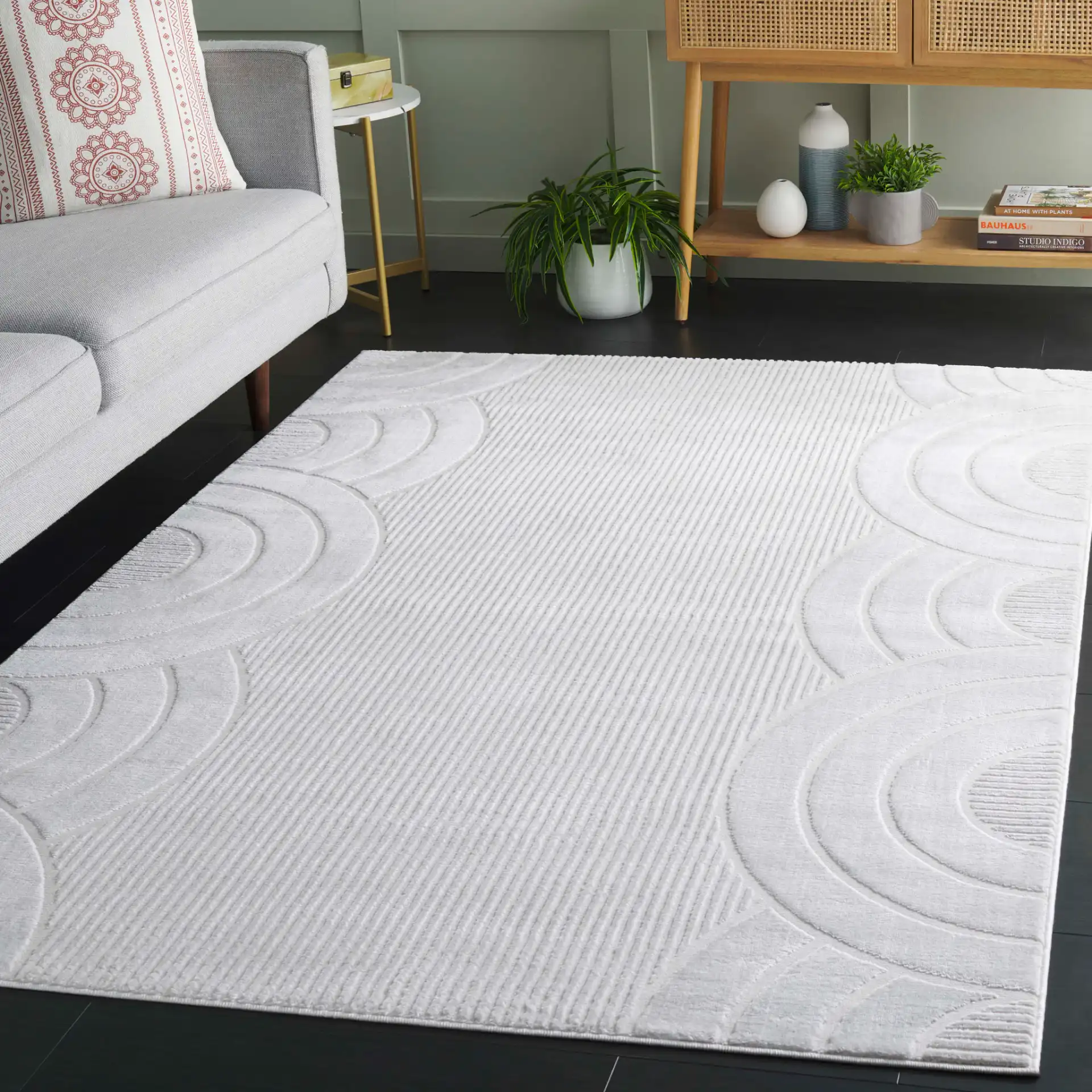 Saylor Arch Rug in Ivory in a styled room