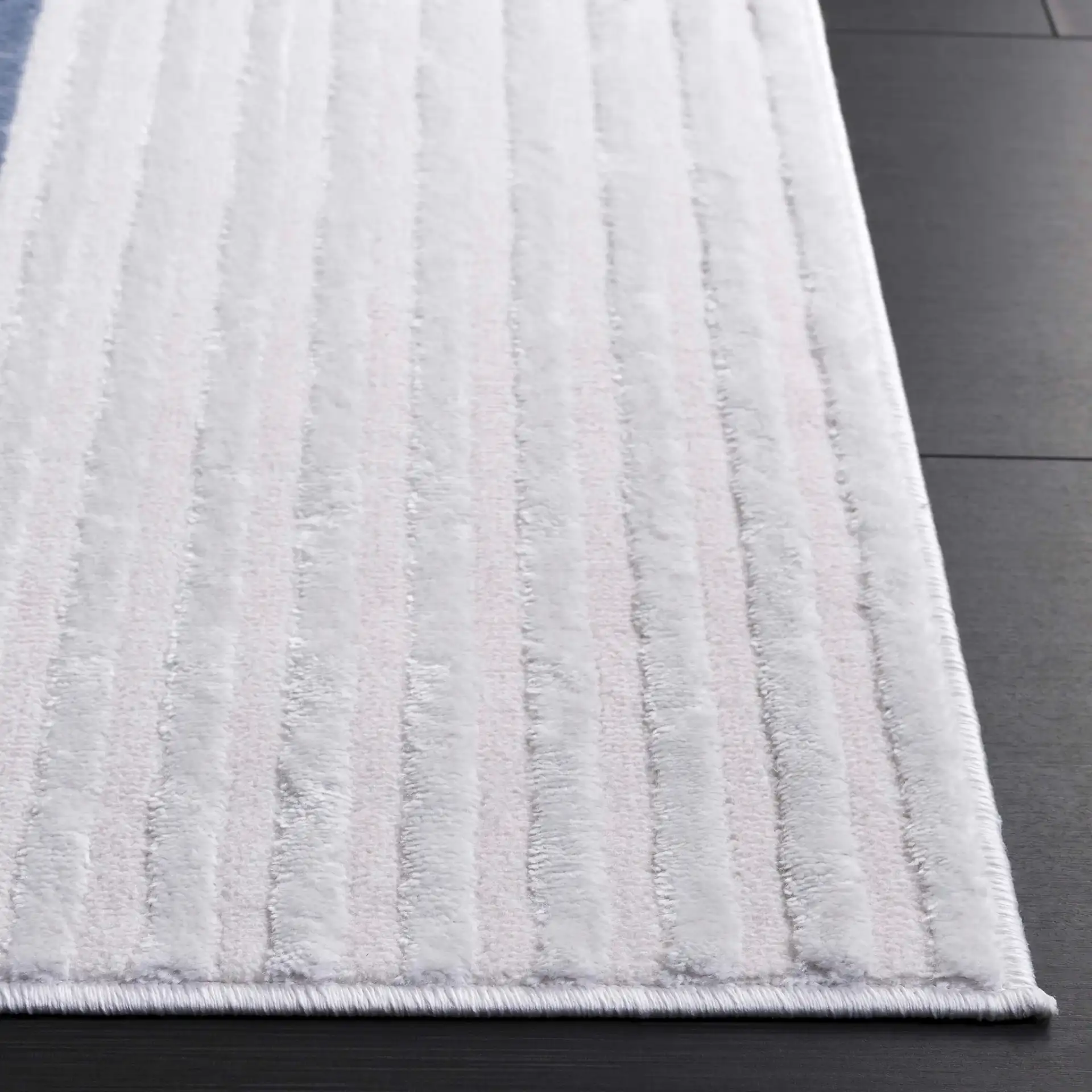Saylor Nested Arch Rug in Ivory / Blue Gray in a styled room