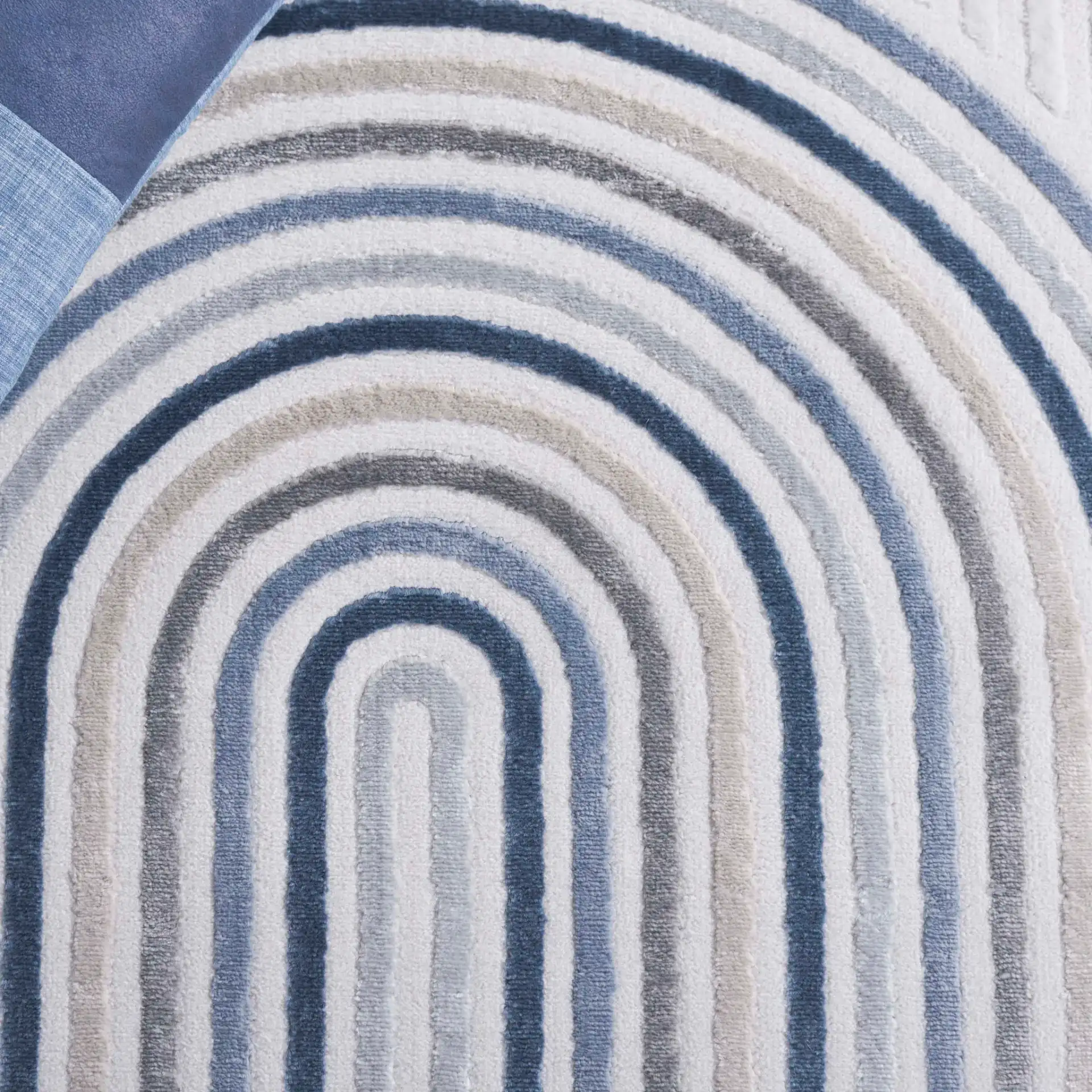 Saylor Nested Arch Rug in Ivory / Blue Gray in a styled room