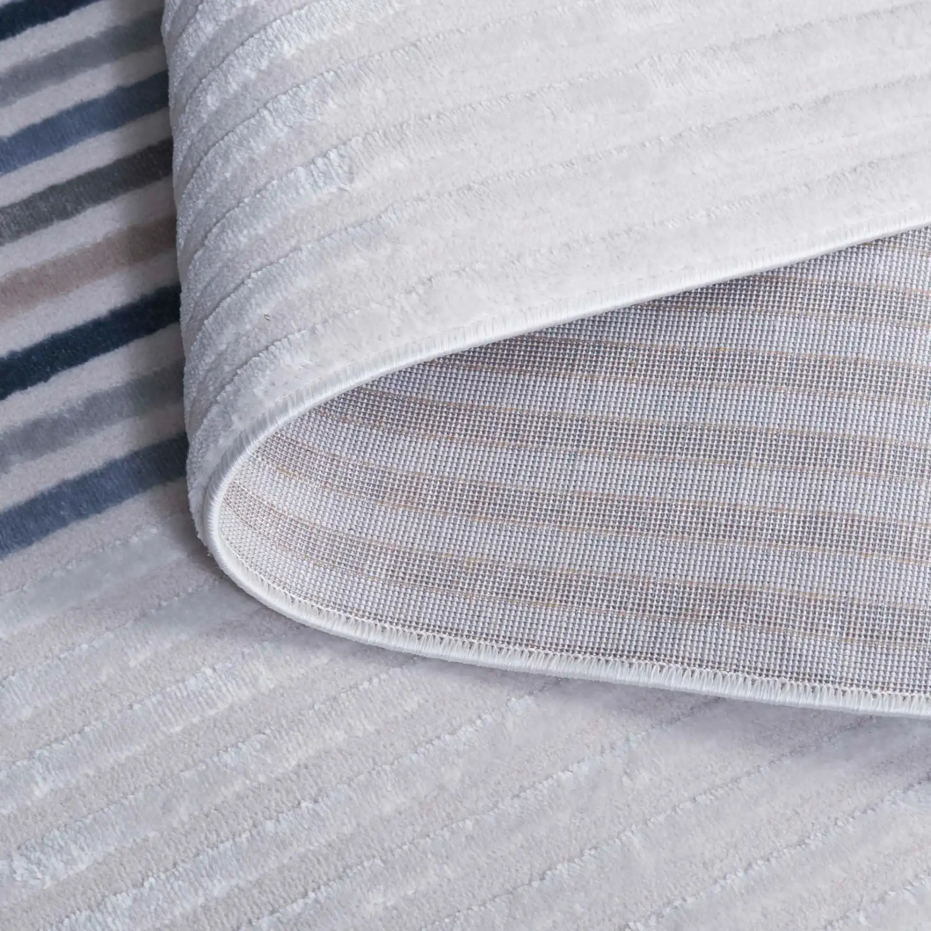 Saylor Nested Arch Rug in Ivory / Blue Gray in a styled room