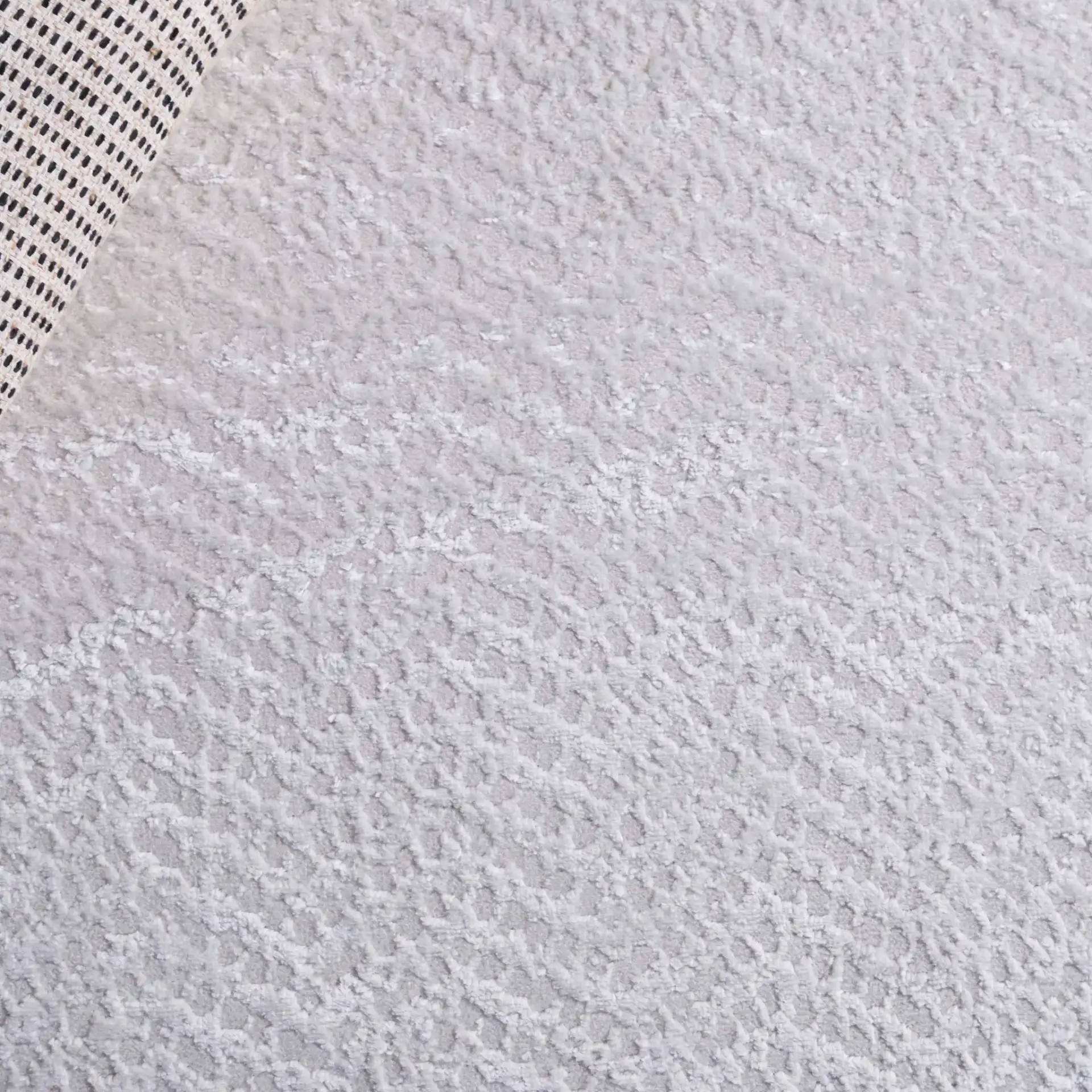 Saylor Chevron Border Rug in Ivory in a styled room