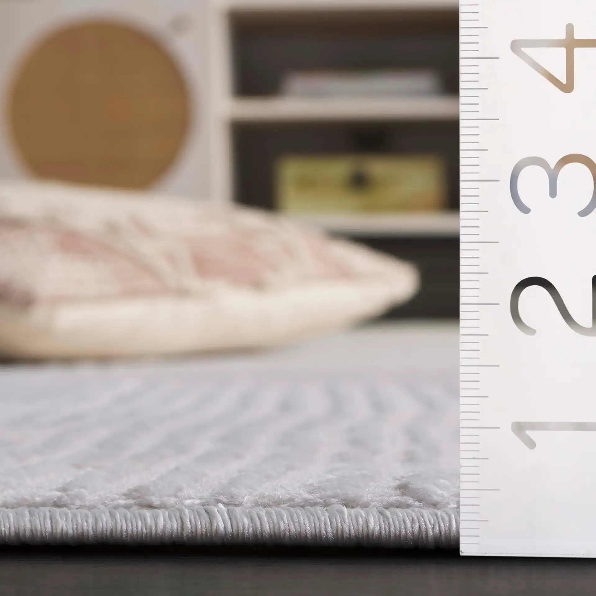Saylor Ribbed Patchwork Rug in Ivory in a styled room