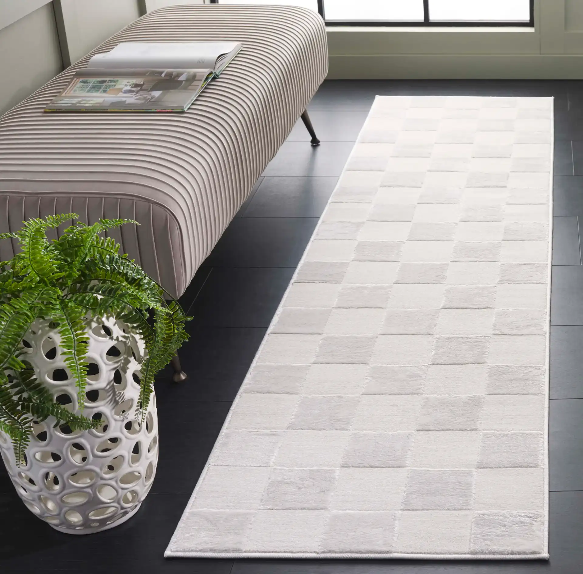 Saylor Checkerboard Rug in Ivory in a styled room