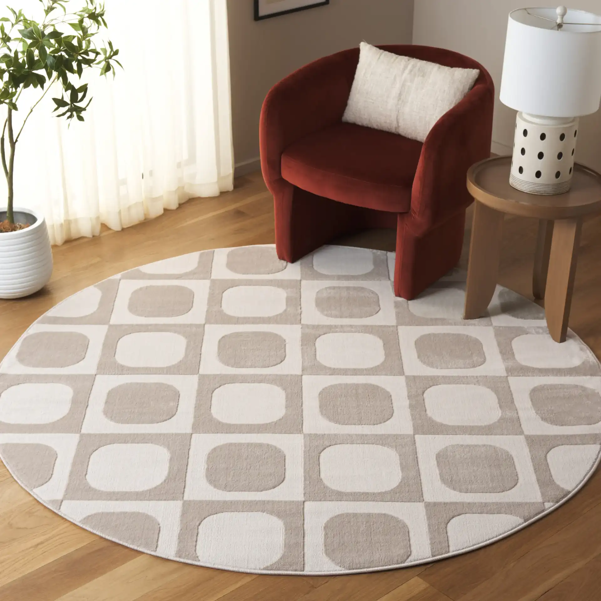 Saylor Rounded Checkerboard Rug in Beige / Ivory in a styled room