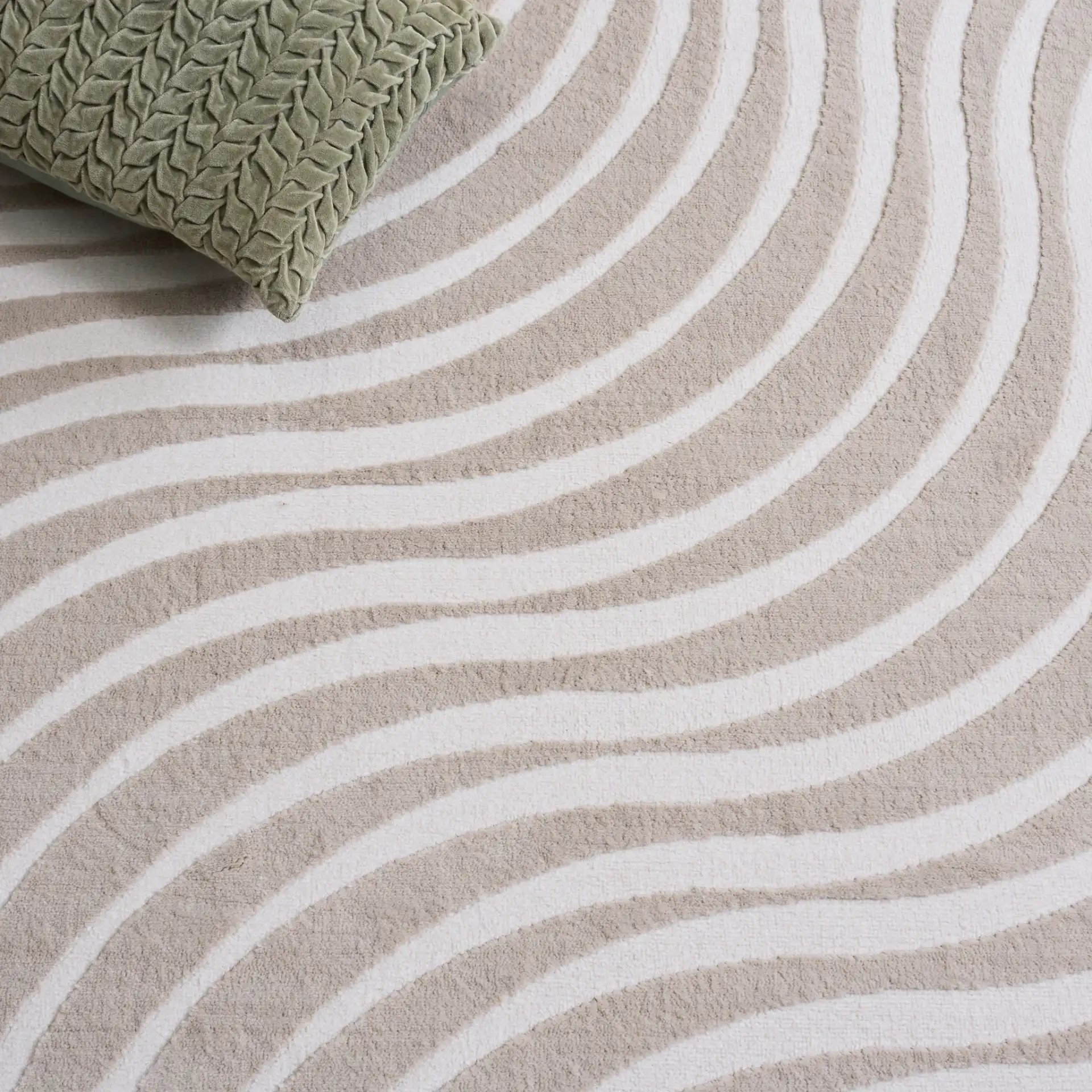 Saylor Wavy Stripe Rug in Beige / Ivory in a styled room