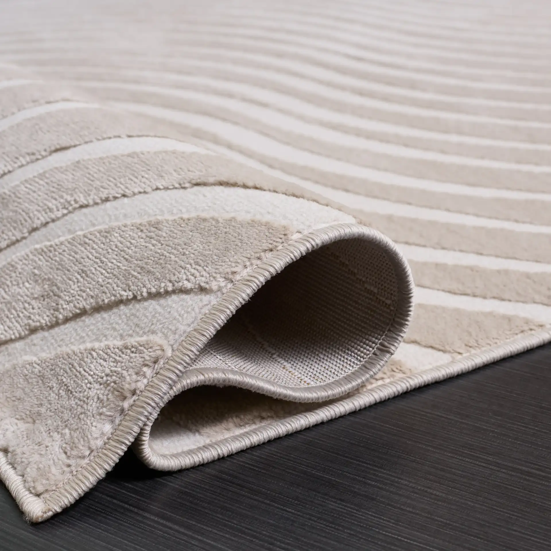 Saylor Wavy Stripe Rug in Beige / Ivory in a styled room