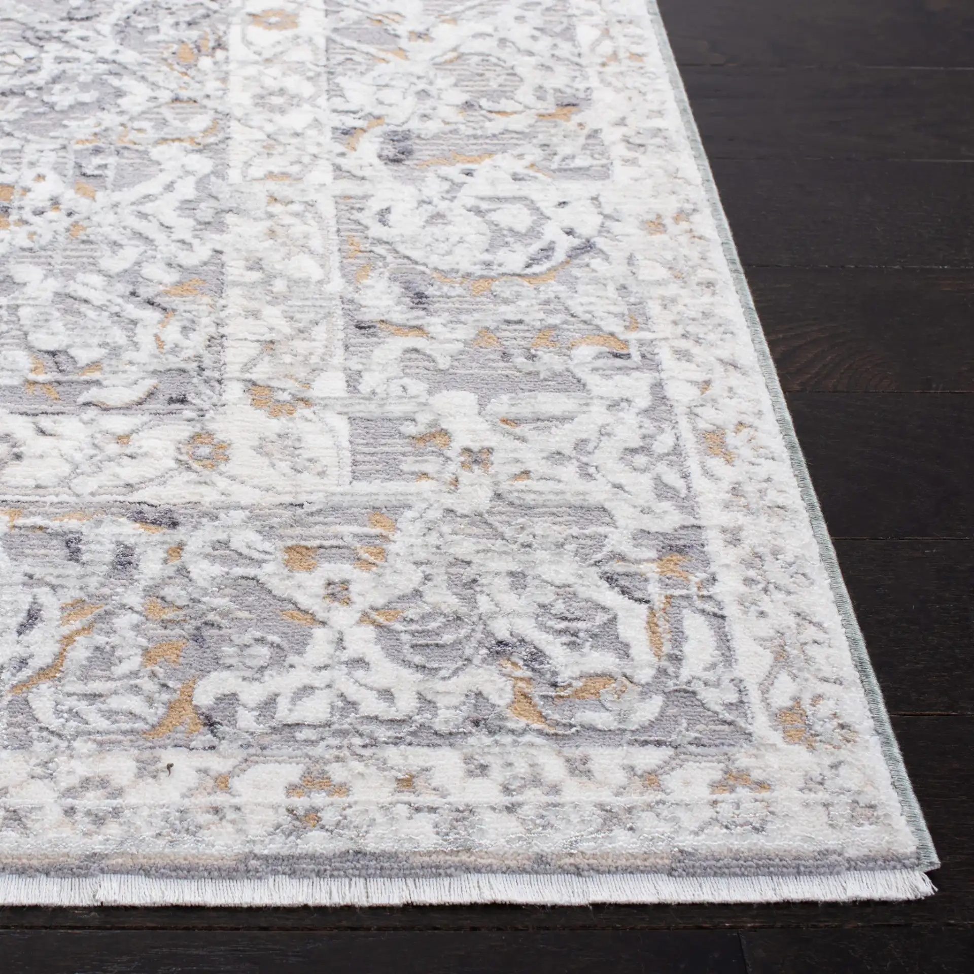 Sabrina Vintage Medallion Bordered Rug in Ivory / Light Gray in a styled room