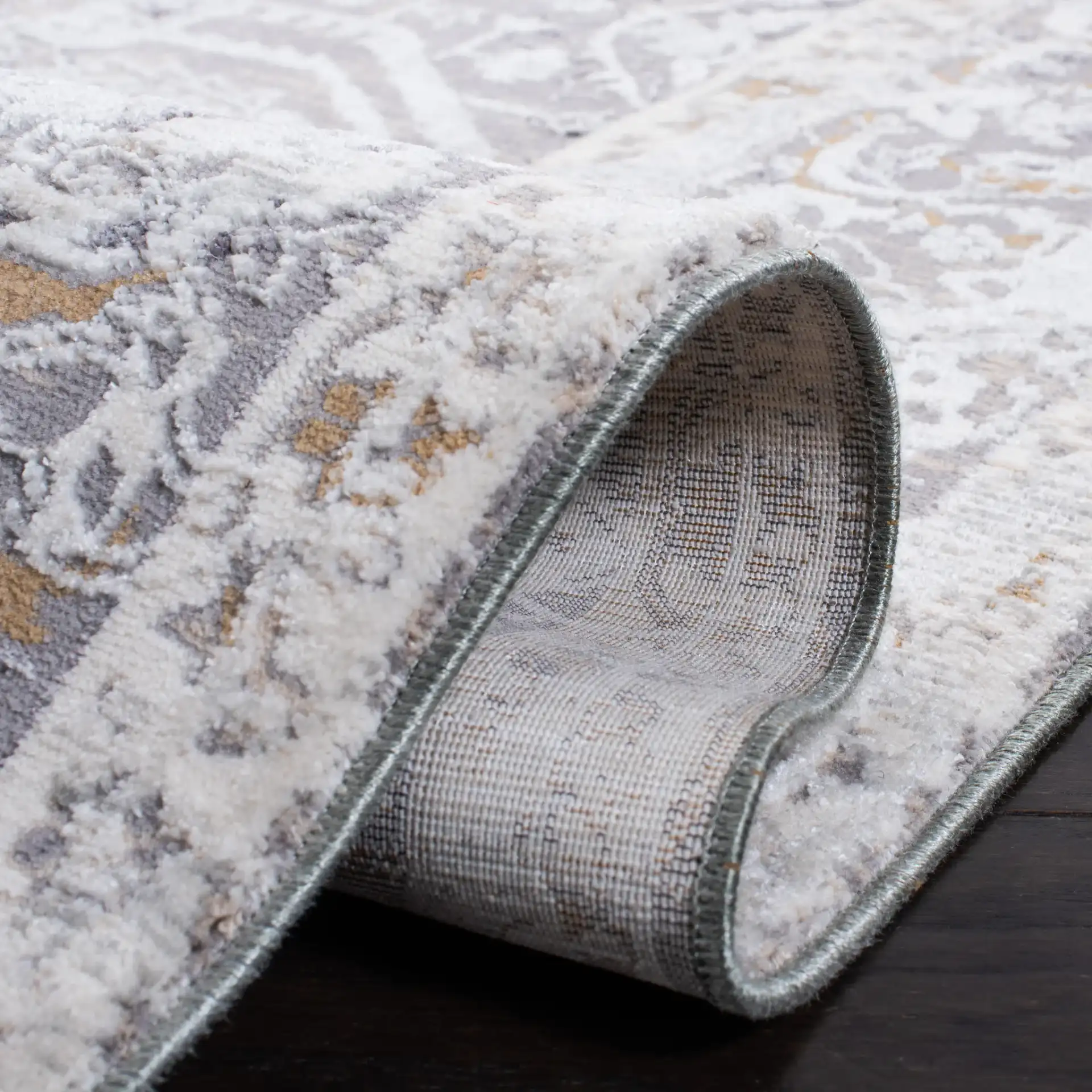 Sabrina Vintage Medallion Bordered Rug in Ivory / Light Gray in a styled room
