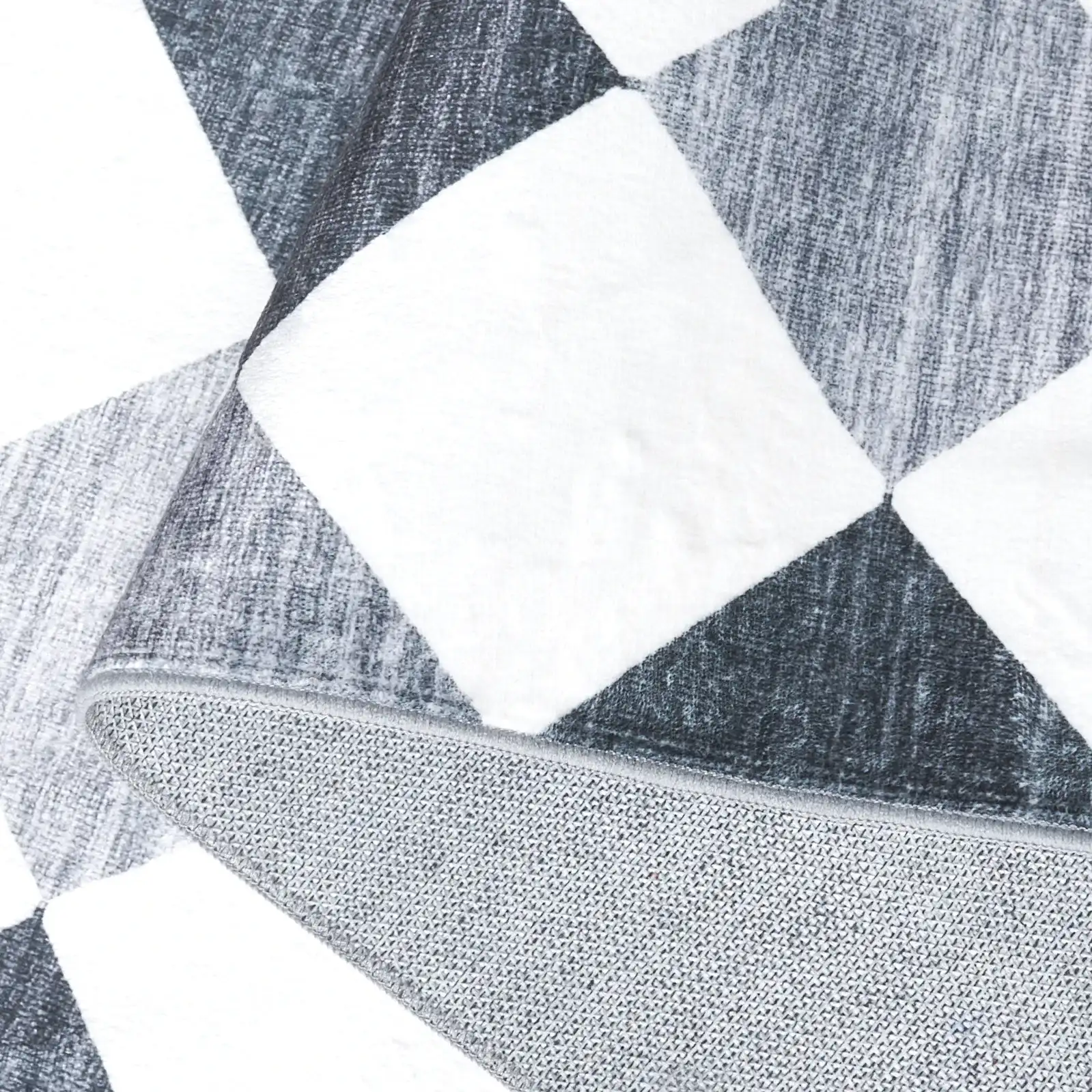 Santa Clara Diamond Washable Rug in Ivory / Gray Black in a styled room