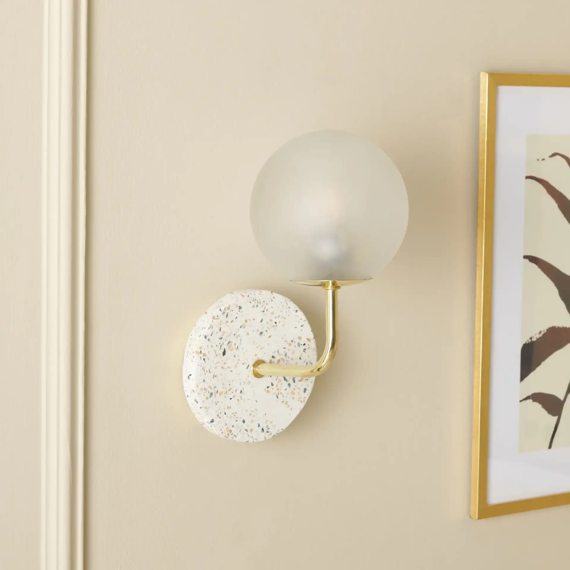 Nicolai Wall Sconce in White / Gold in a styled room