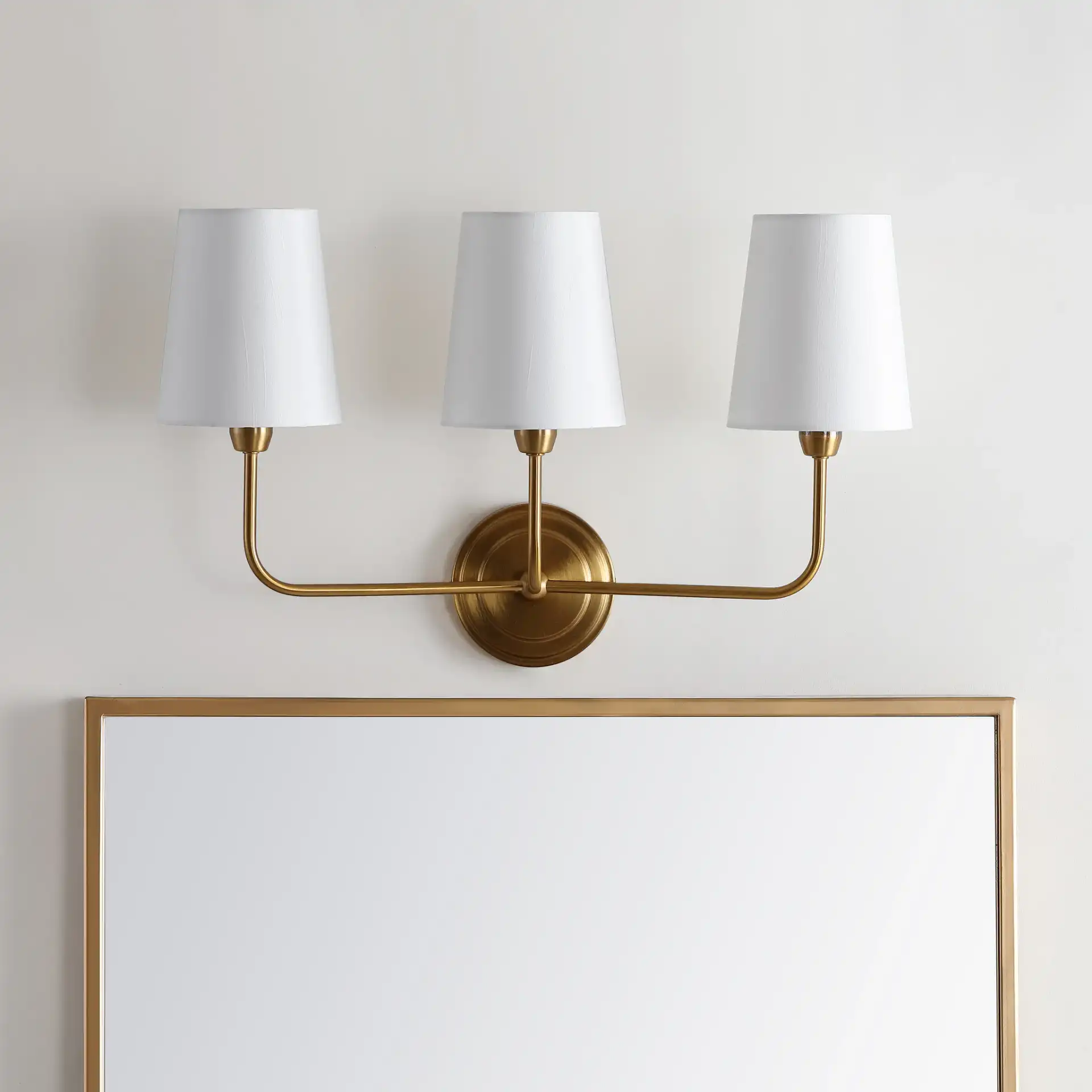 Sawyer Three-Light Wall Sconce in Brass, detail view