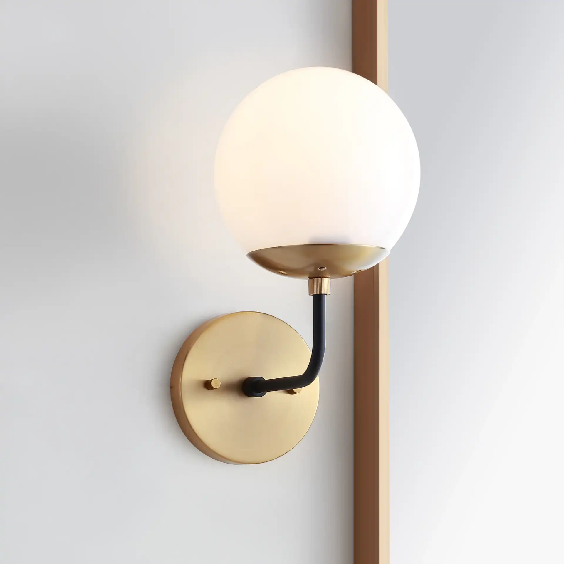 Cayden Wall Sconce in Brown / White in a styled room