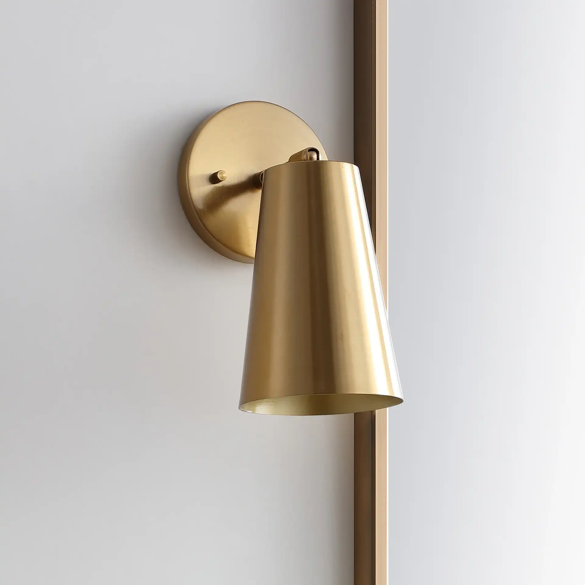 Leonardo Wall Sconce in Brown / White in a styled room