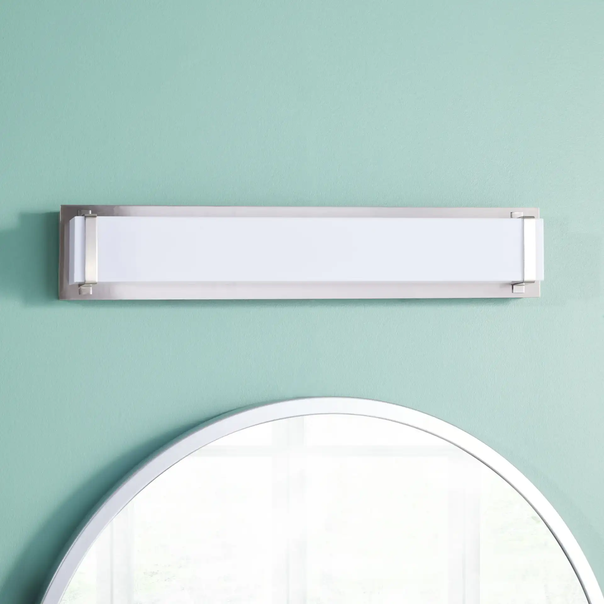 Gannon Vanity Bar Sconce in Bronze in a styled room