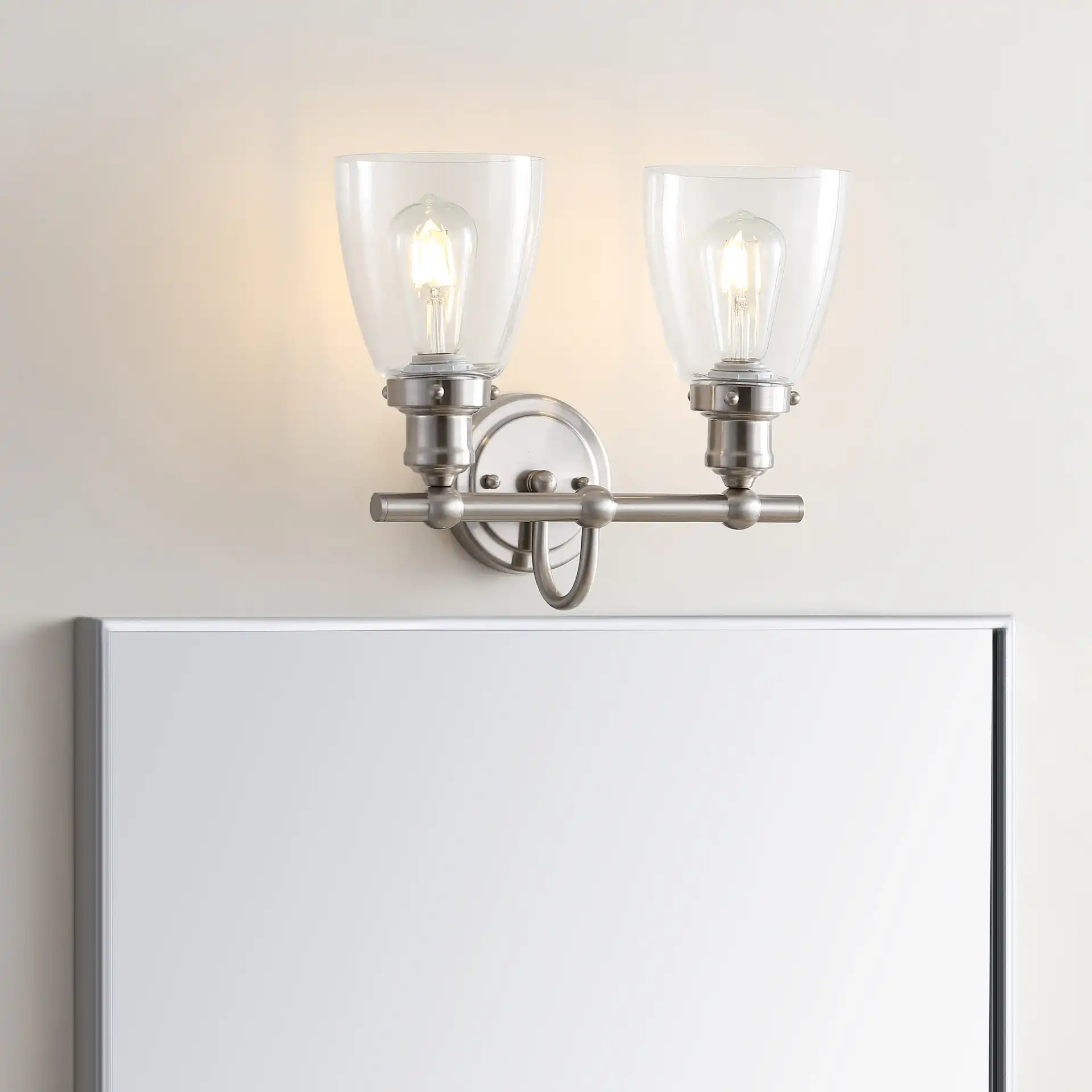 Layton Two-Light Sconce in Bronze in a styled room