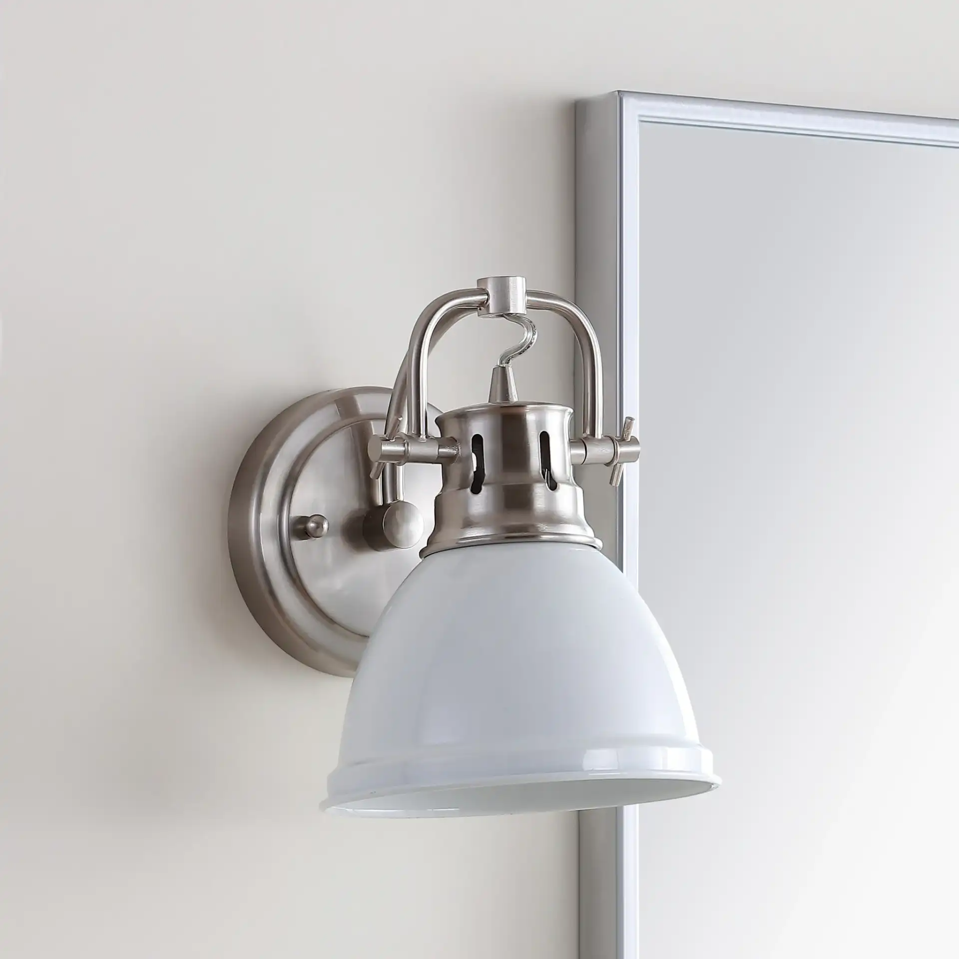 Lawson Sconce in White in a styled room
