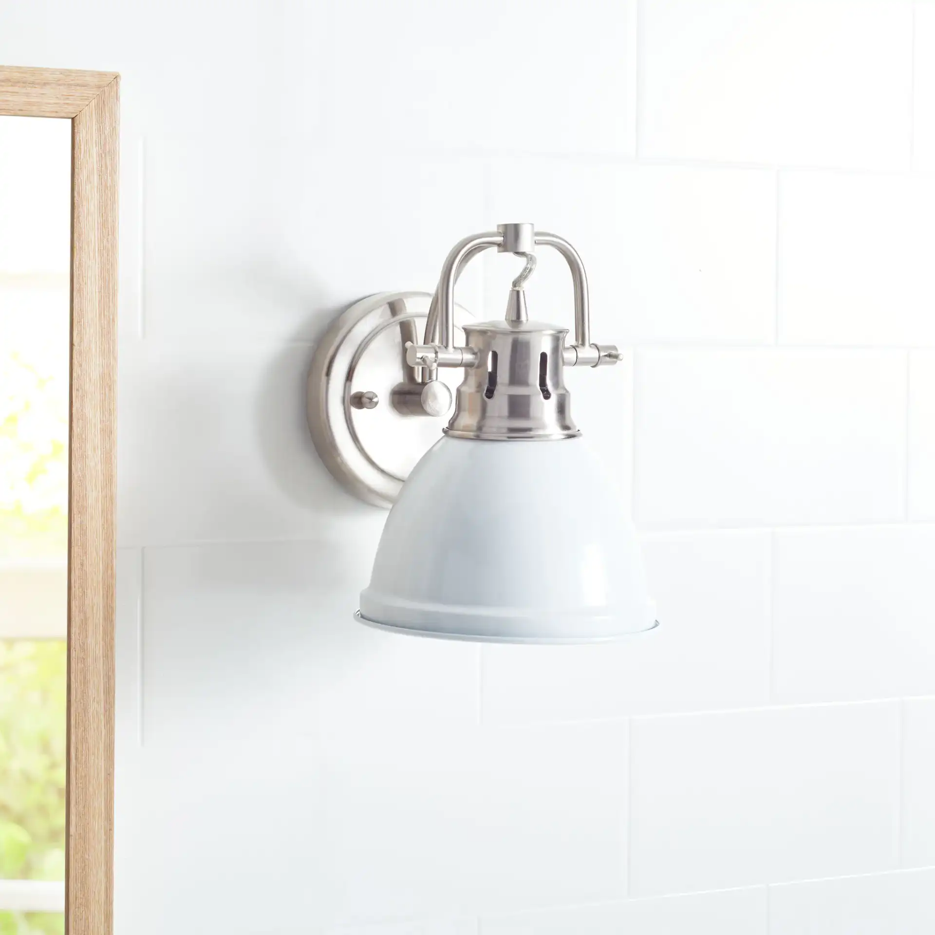 Lawson Sconce in White in a styled room