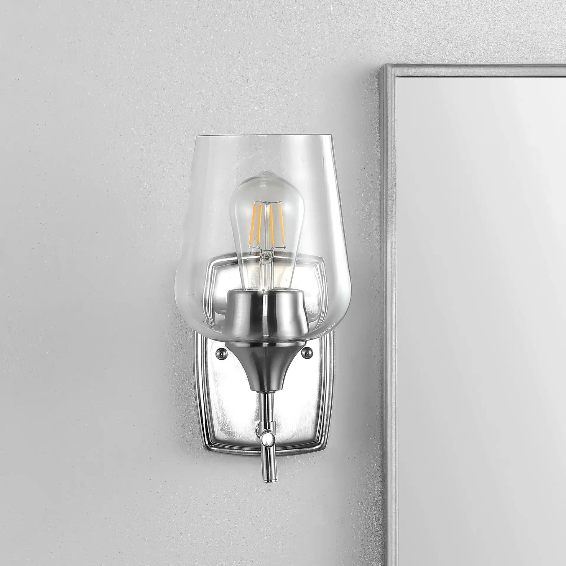Valda Wall Sconce in Nickel / Clear in a styled room