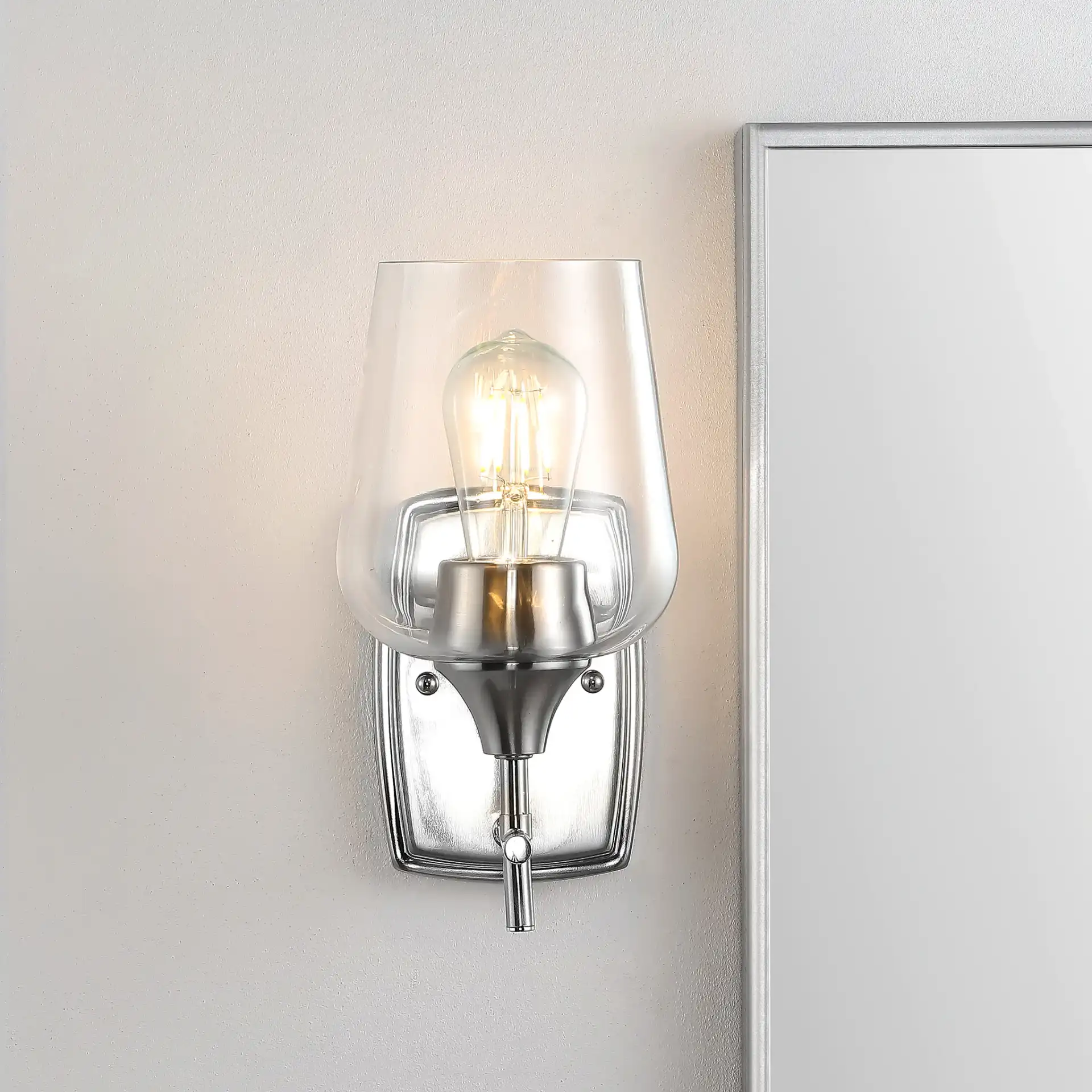 Valda Wall Sconce in Nickel / Clear in a styled room