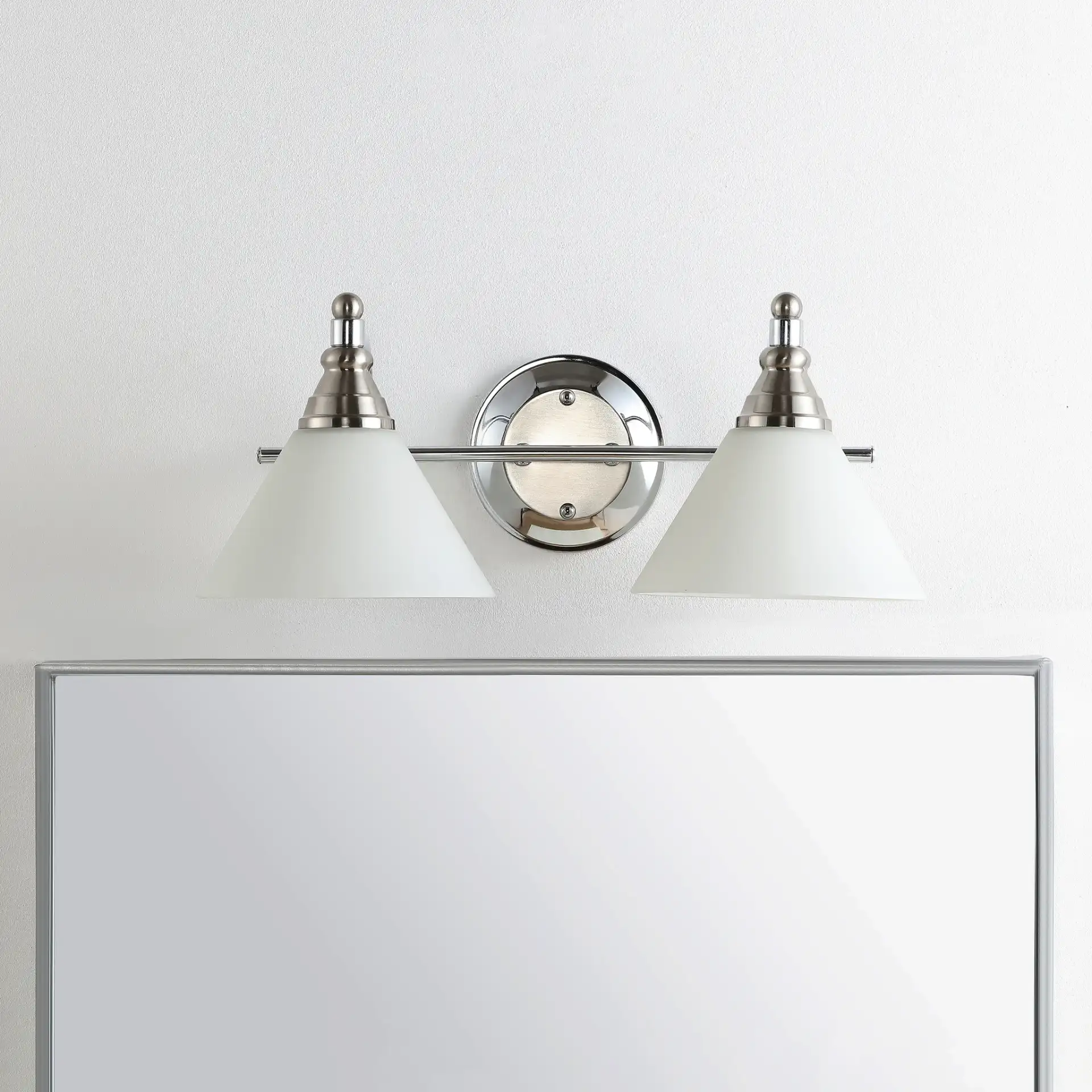 Radnor Wall Sconce in Nickel / White in a styled room