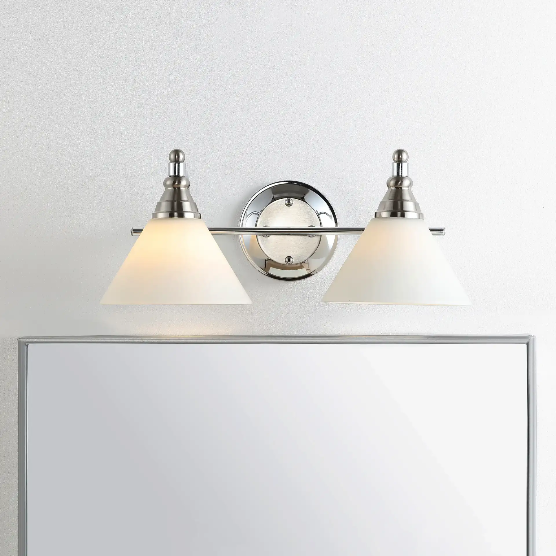 Radnor Wall Sconce in Nickel / White in a styled room