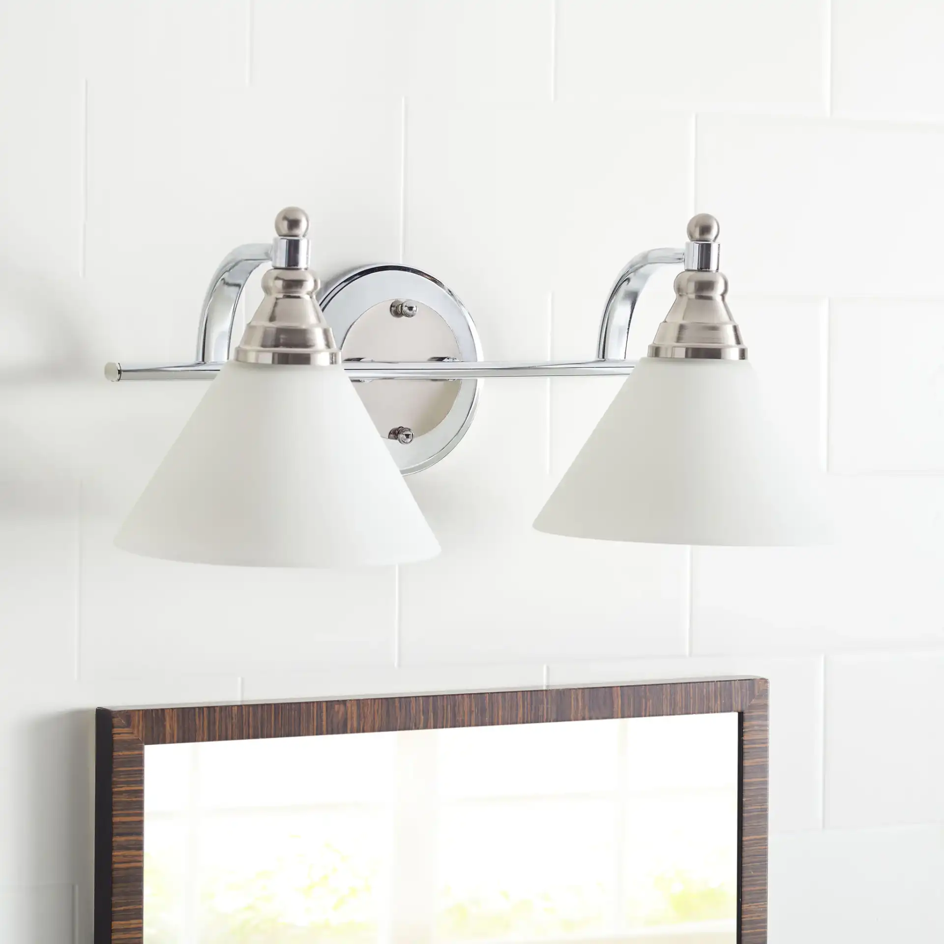 Radnor Wall Sconce in Nickel / White in a styled room