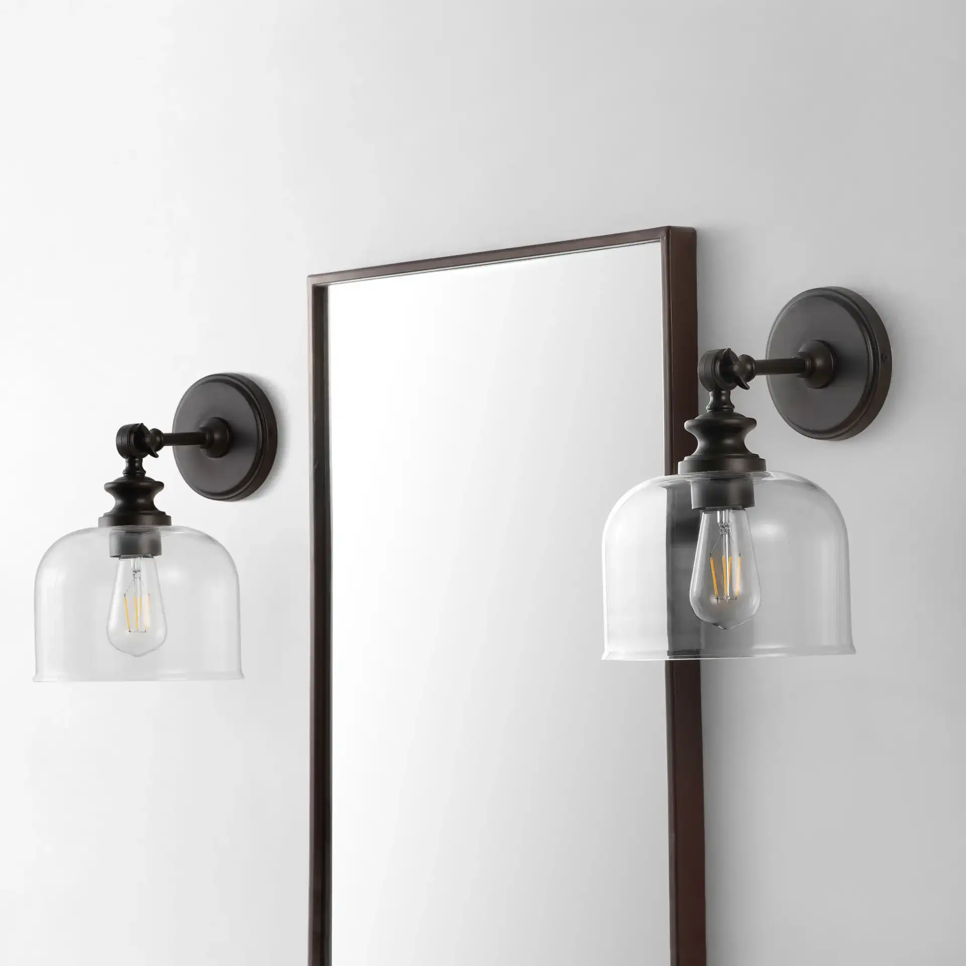Neri Wall Sconce (Set Of 2) in Oil Rub Bronze / Clear in a styled room