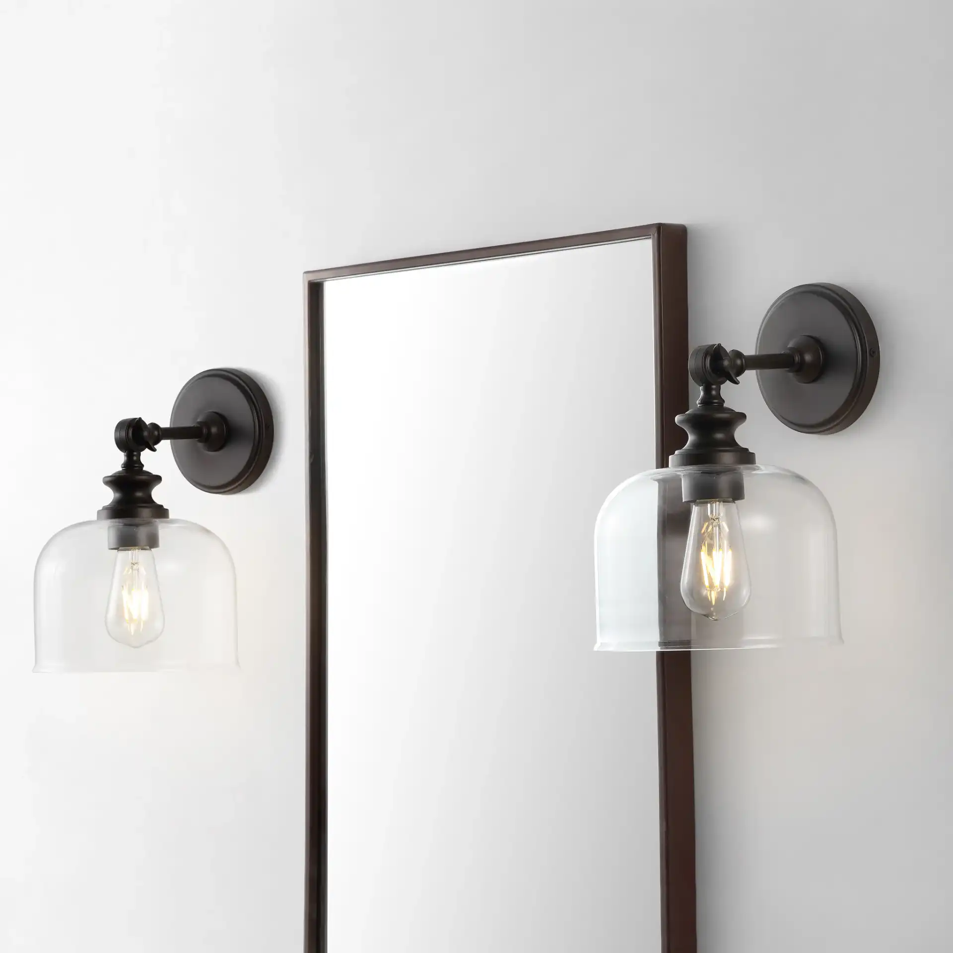 Neri Wall Sconce (Set Of 2) in Oil Rub Bronze / Clear in a styled room