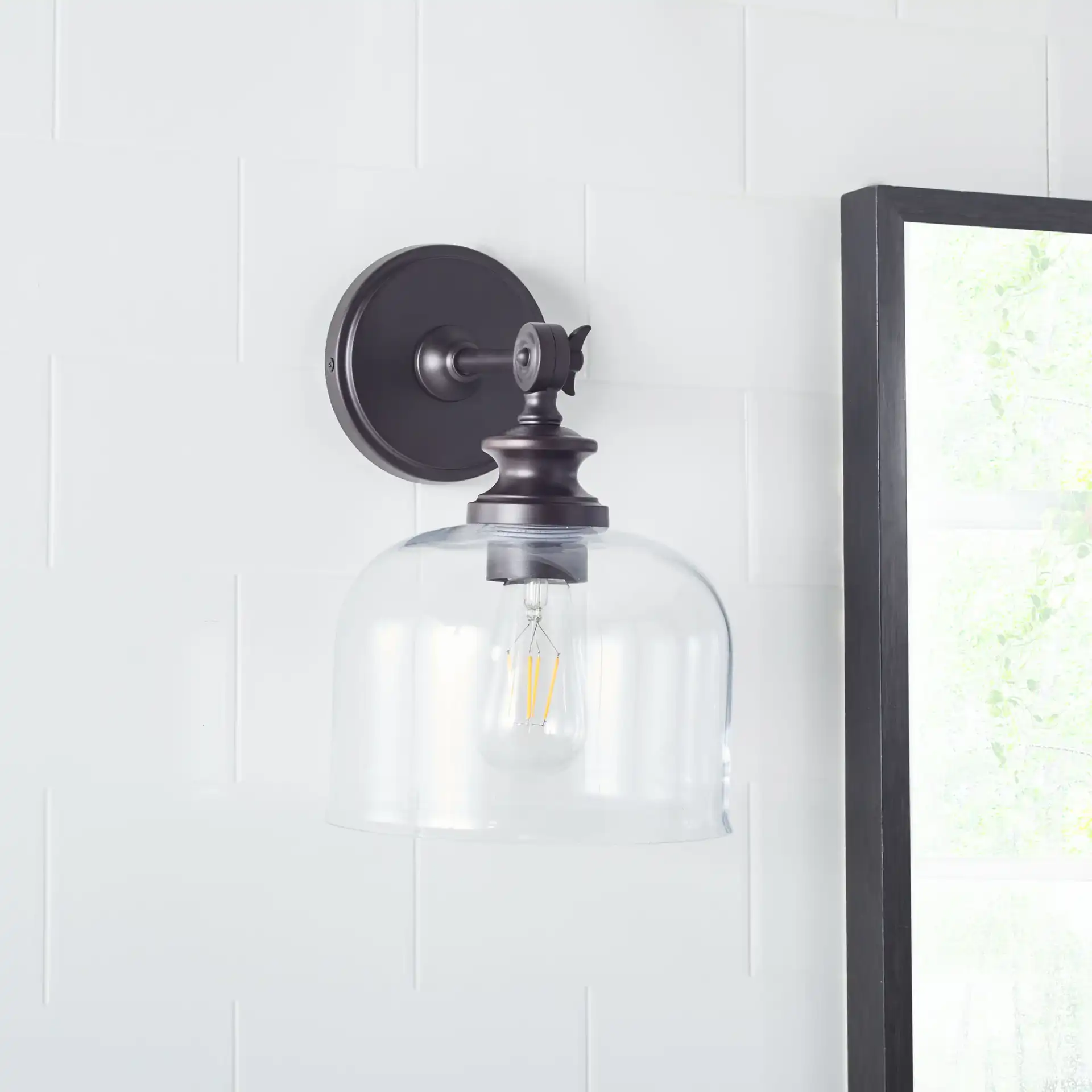 Neri Wall Sconce (Set Of 2) in Oil Rub Bronze / Clear in a styled room