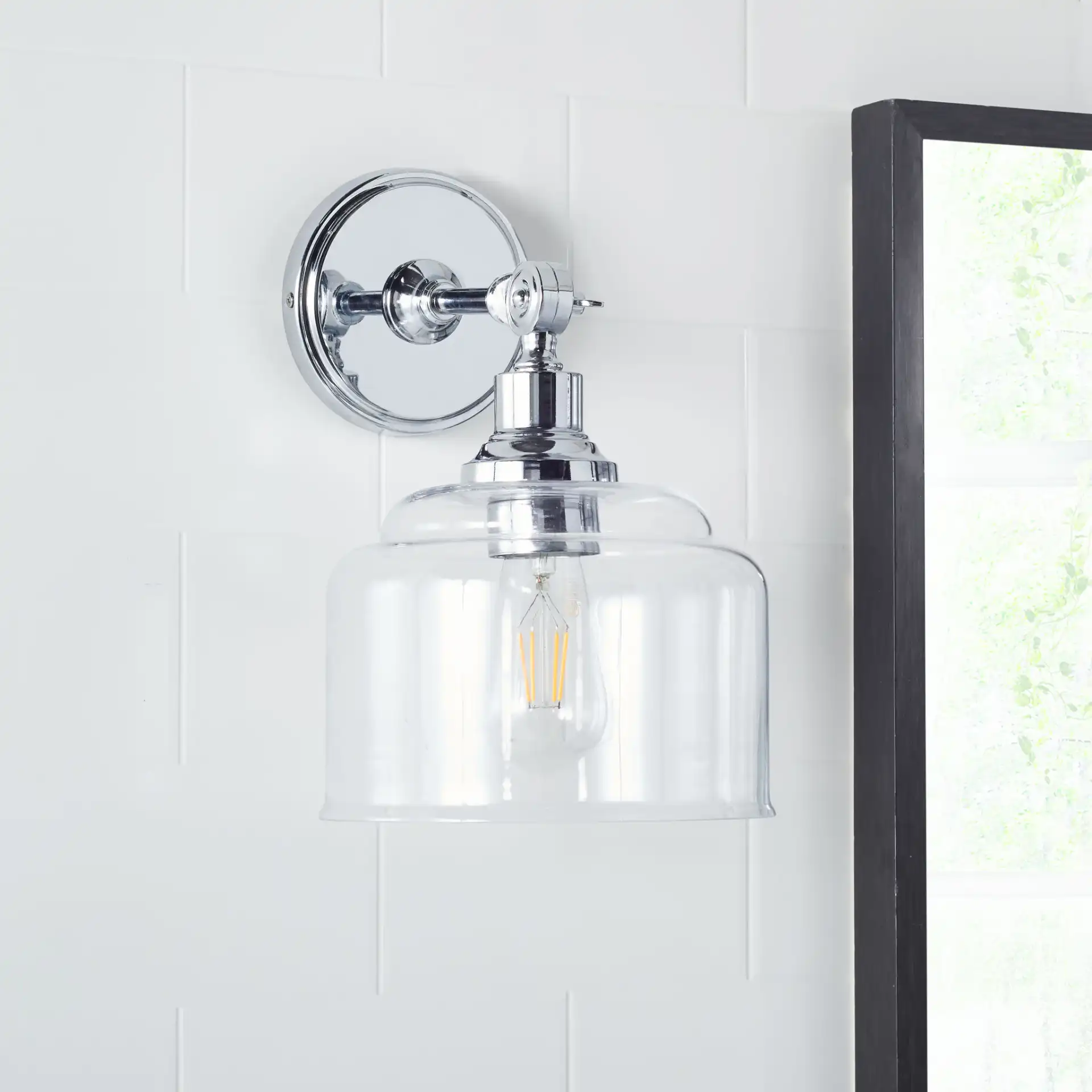 Lansor Wall Sconce (Set Of 2) in Chrome / Clear in a styled room