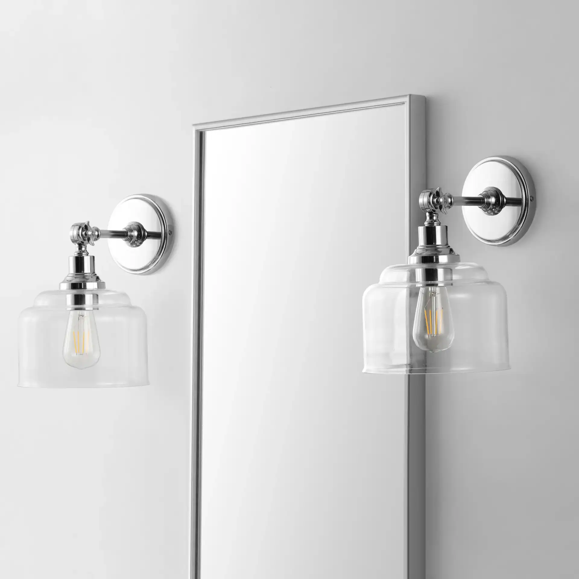 Lansor Wall Sconce (Set Of 2) in Chrome / Clear in a styled room