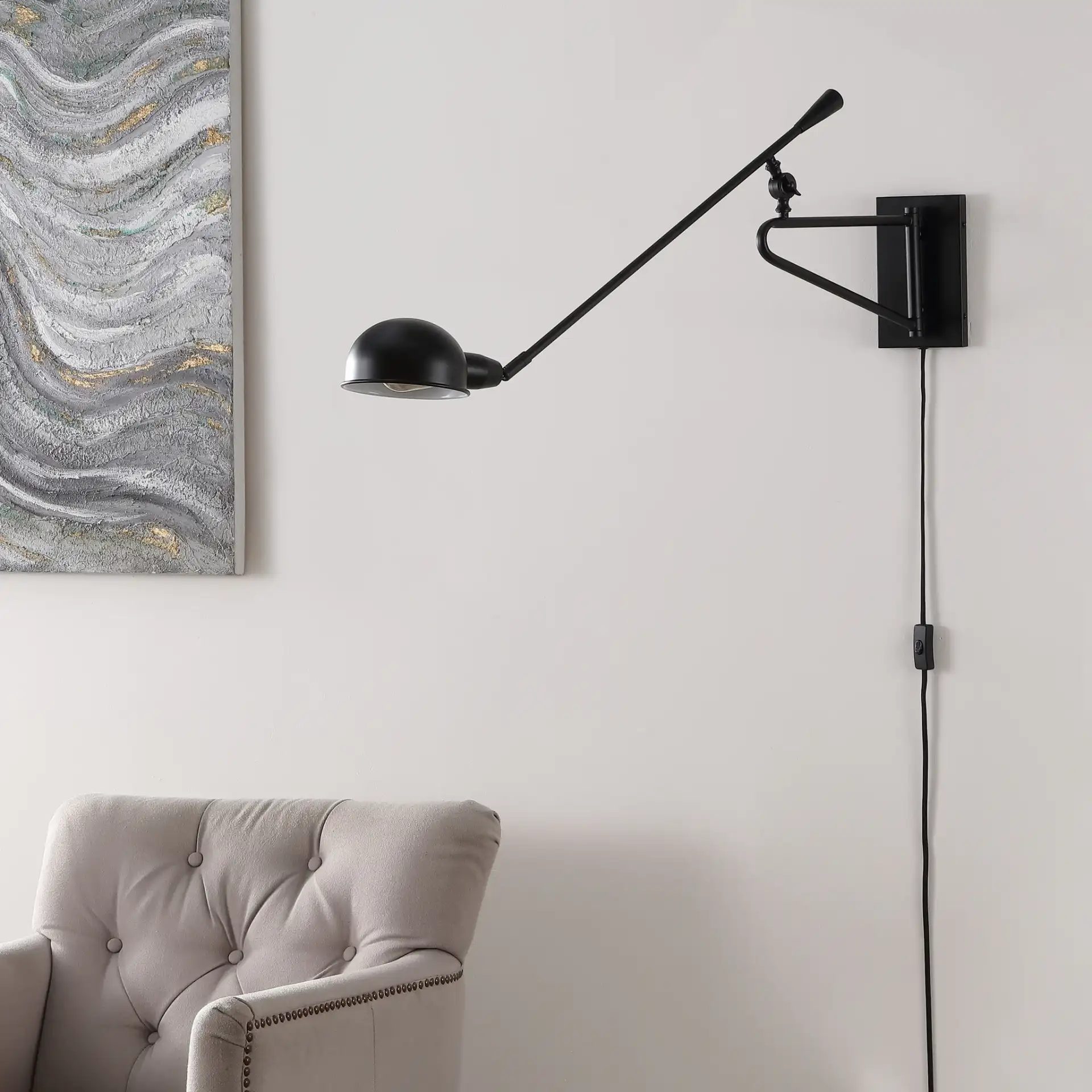 Moxley Wall Sconce in Black in a styled room