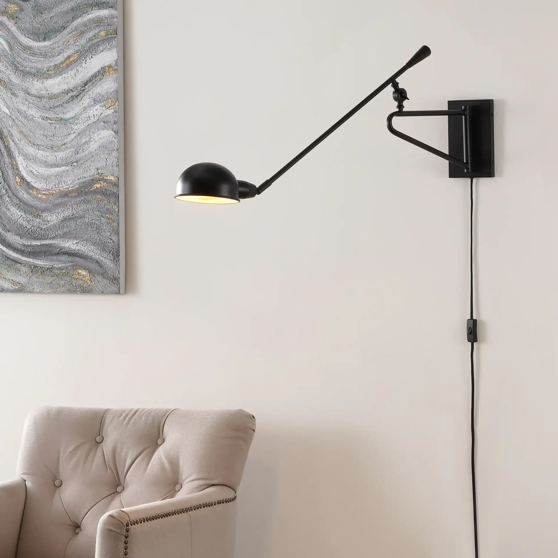 Moxley Wall Sconce in Black in a styled room