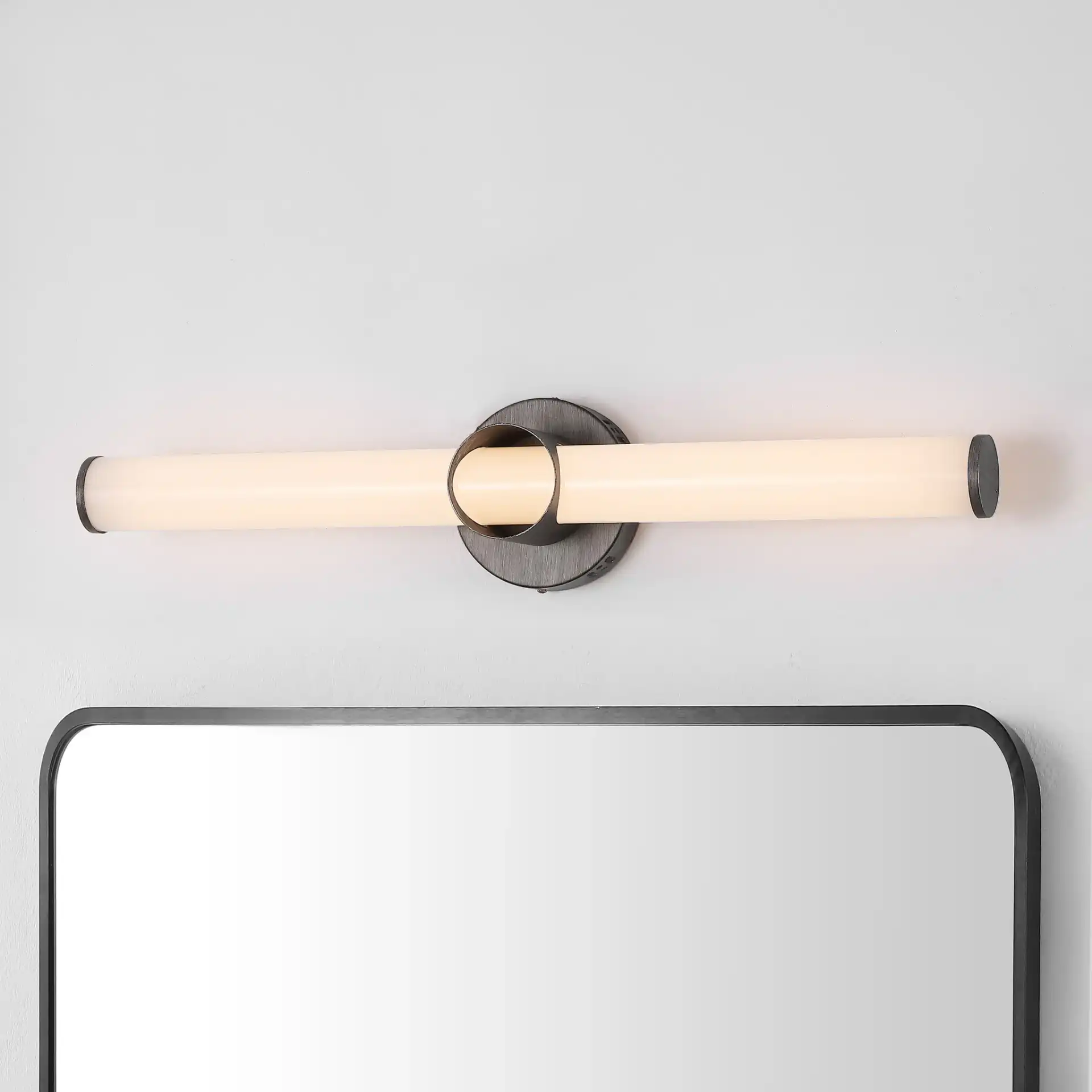 Xerxes Led Wall Sconce in Antique Silver in a styled room