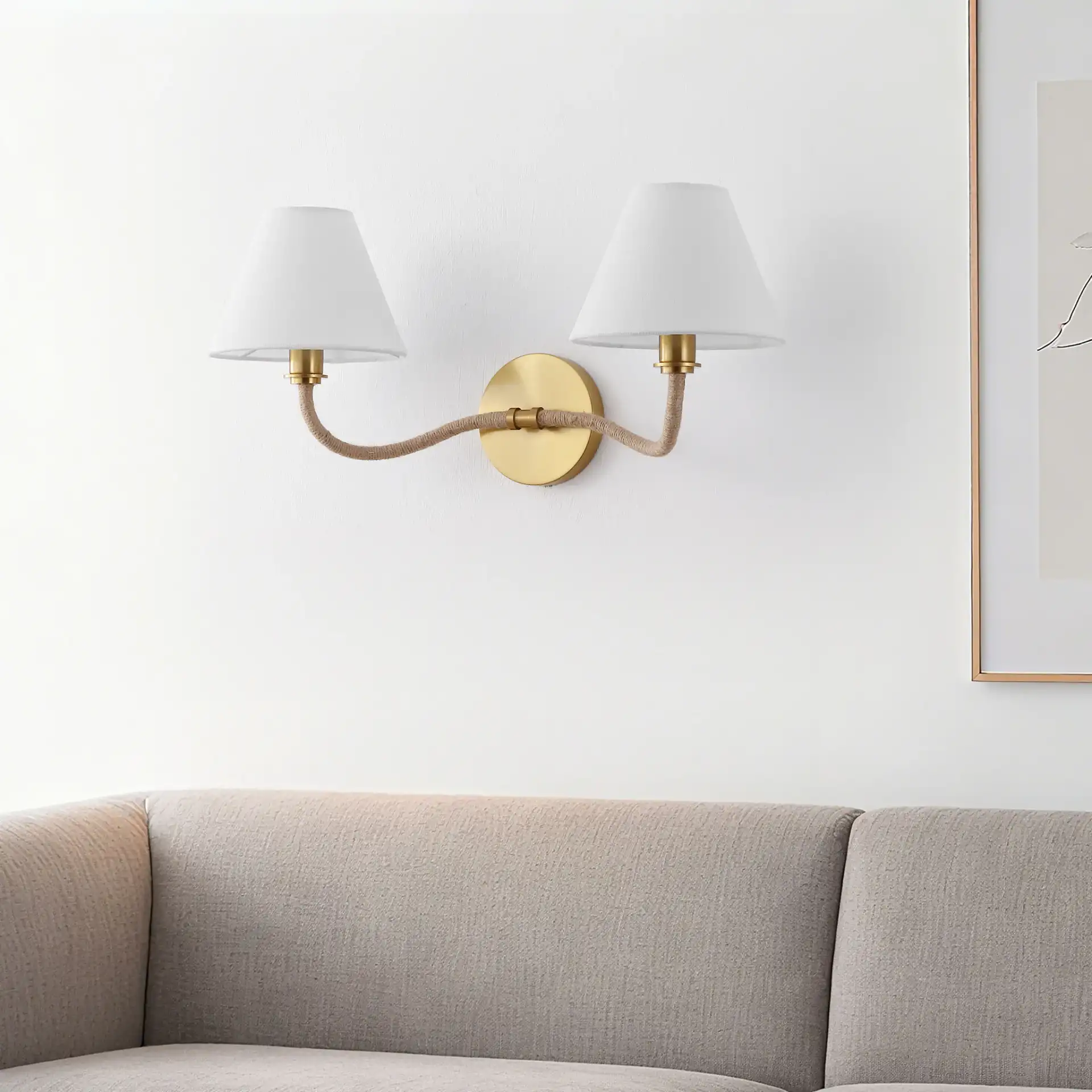 Mara Wall Sconce in Brass / White in a styled room