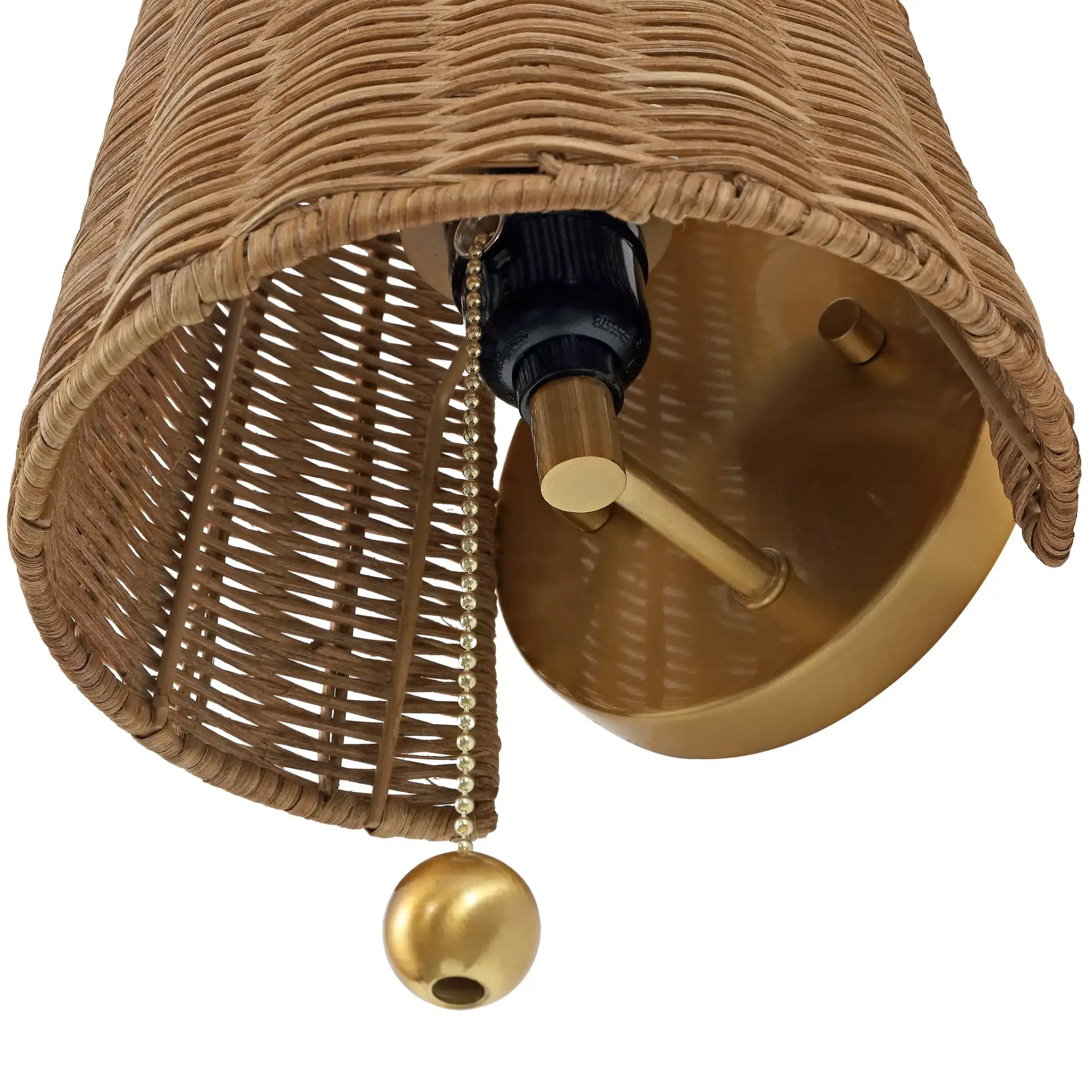 Yanah Iron / Rattan Wall Sconce in Brass Gold / Natural in a styled room