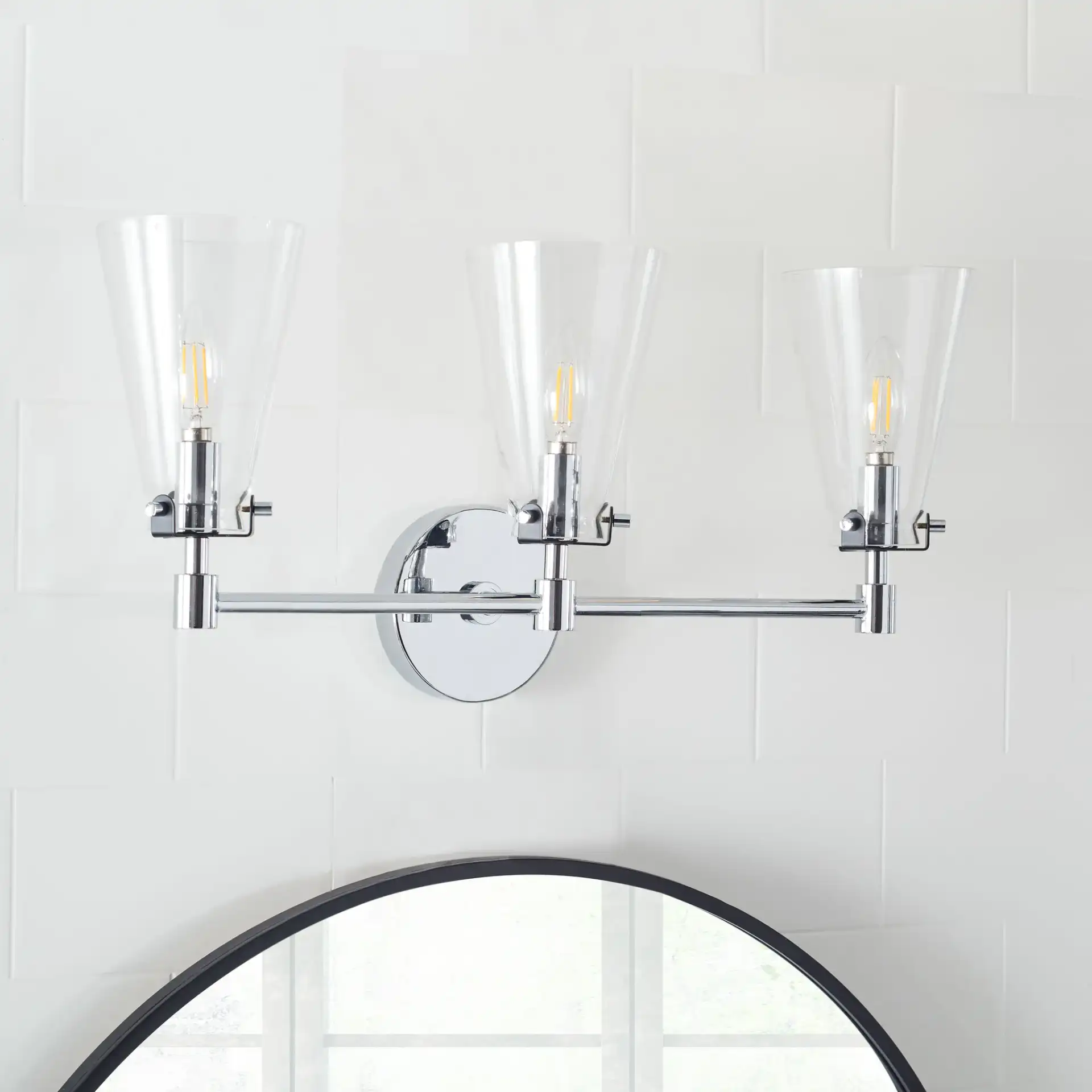 Lonsen Vanity Sconce in Chrome in a styled room