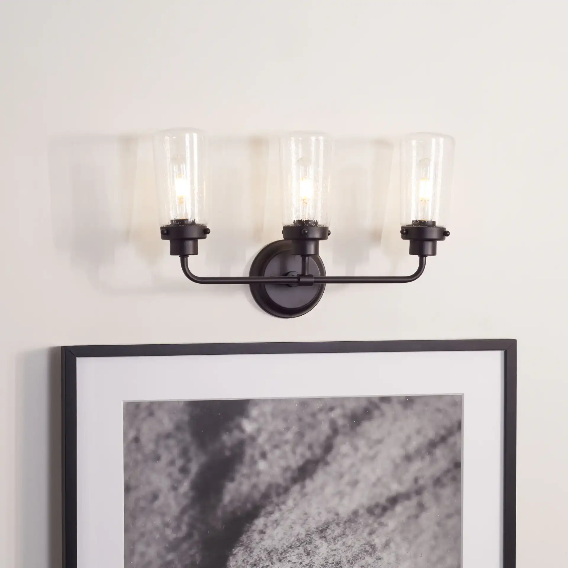 Derser Vanity Sconce in Oil Rubbed Bronze in a styled room