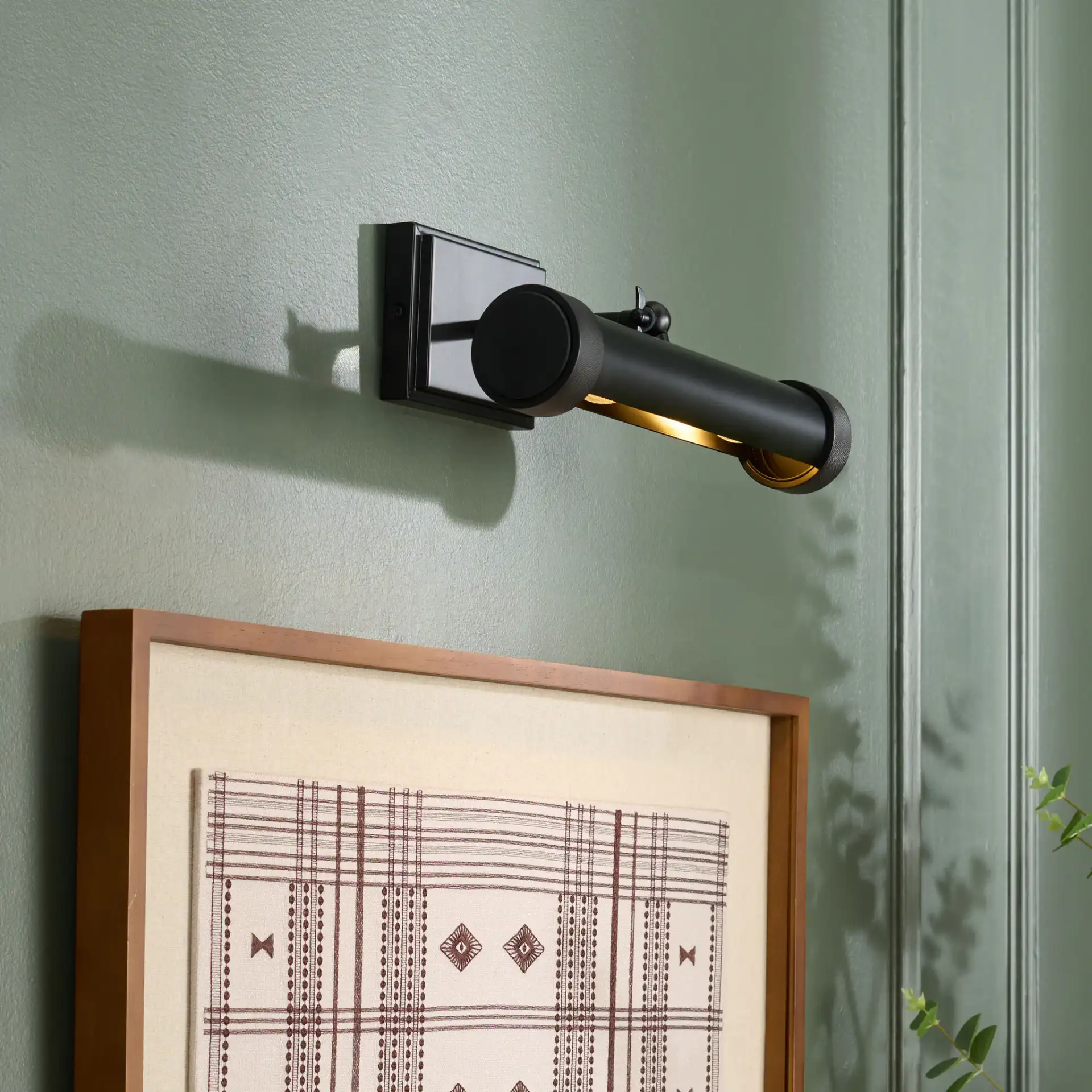 Andie Wall Sconce in Black in a styled room