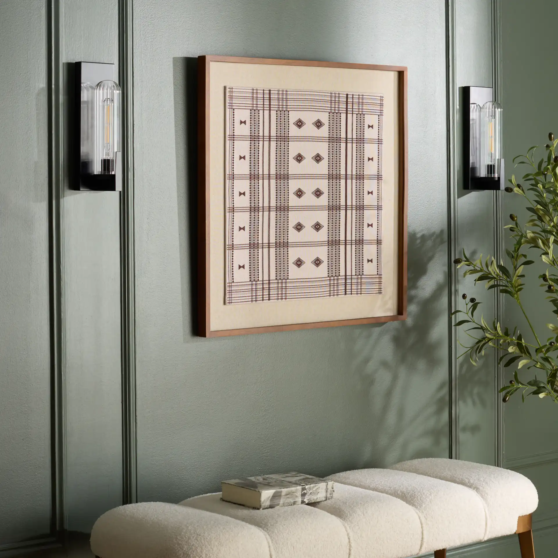 Nicola Wall Sconce (Set of 2) in Black in a styled room