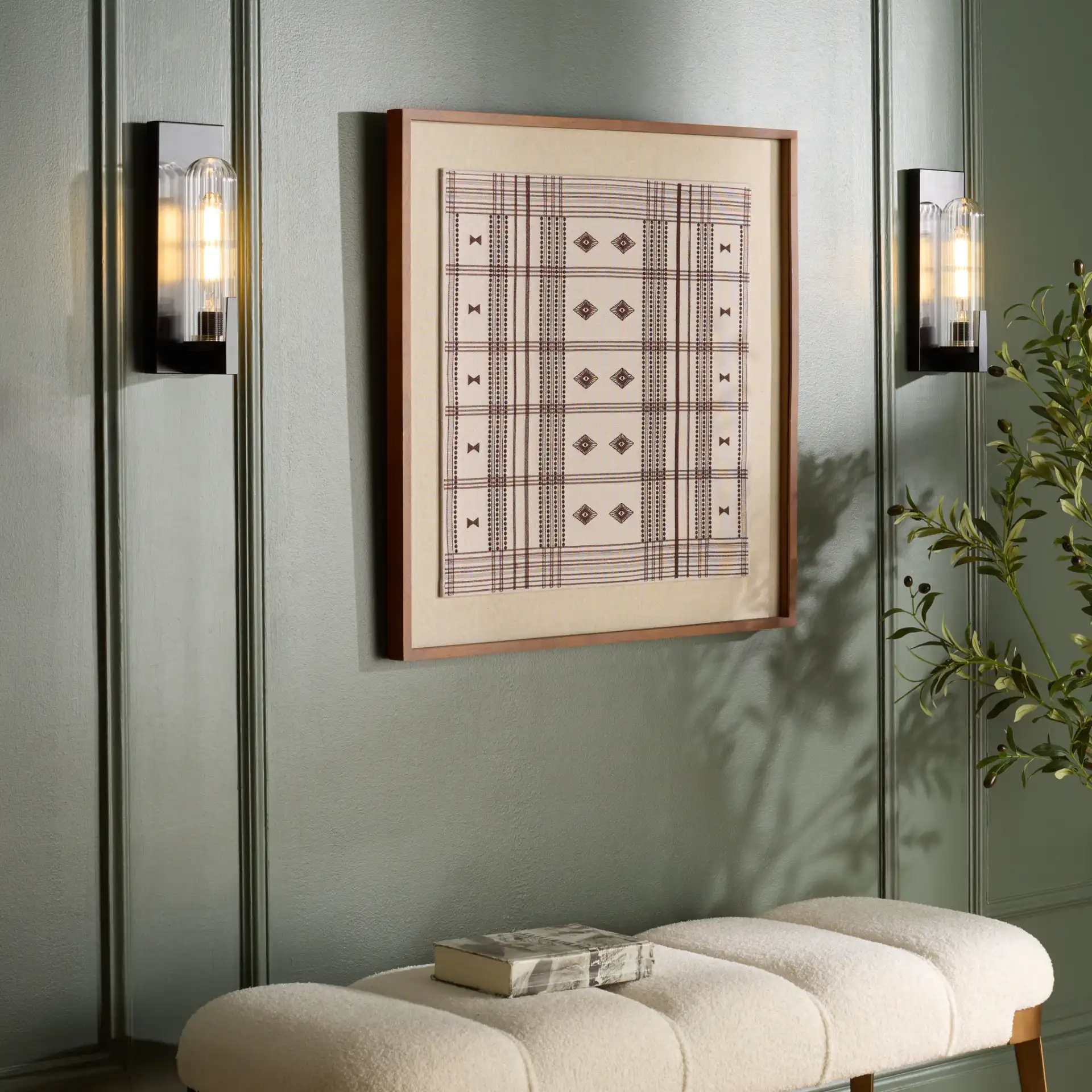 Nicola Wall Sconce (Set of 2) in Black in a styled room