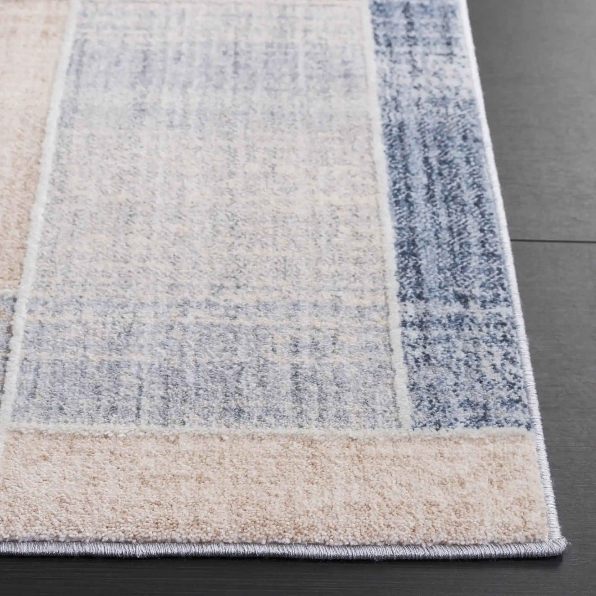 Scarlett Block Patchwork Rug in Beige / Blue Brown in a styled room