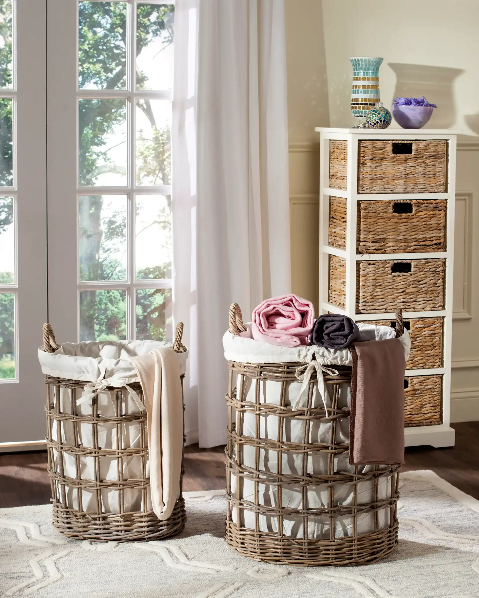 Adisa Set Of Two Laundry Baskets in Gray in a styled room
