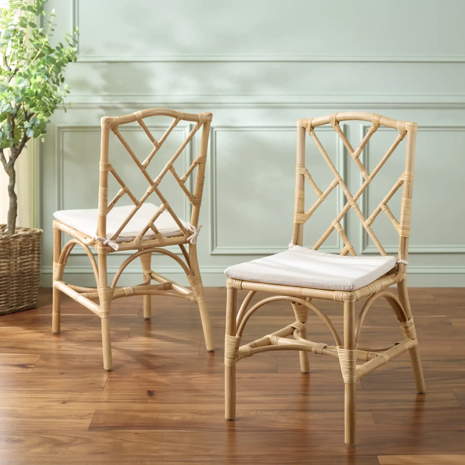 Chadale Rattan Dining Chair (Set of 2) in Natural / Cream in a styled room