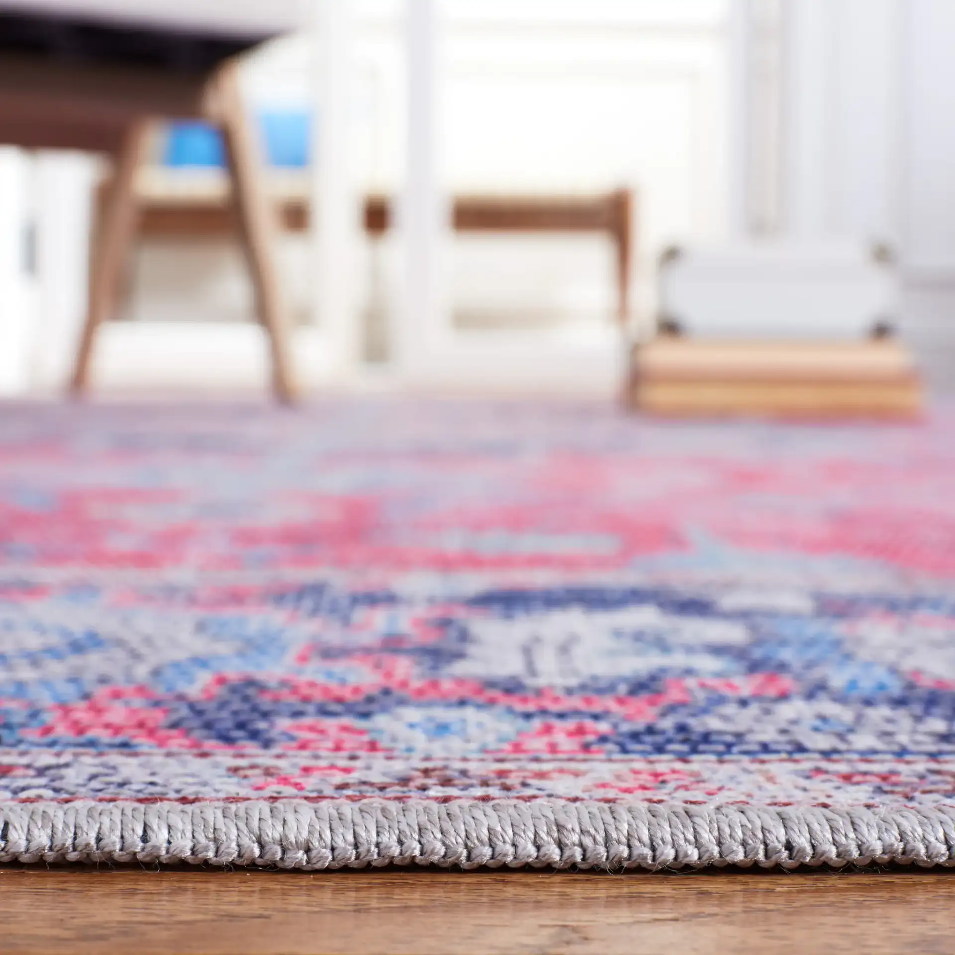 Serapi Stepped Medallion Washable Rug in Red / Navy in a styled room
