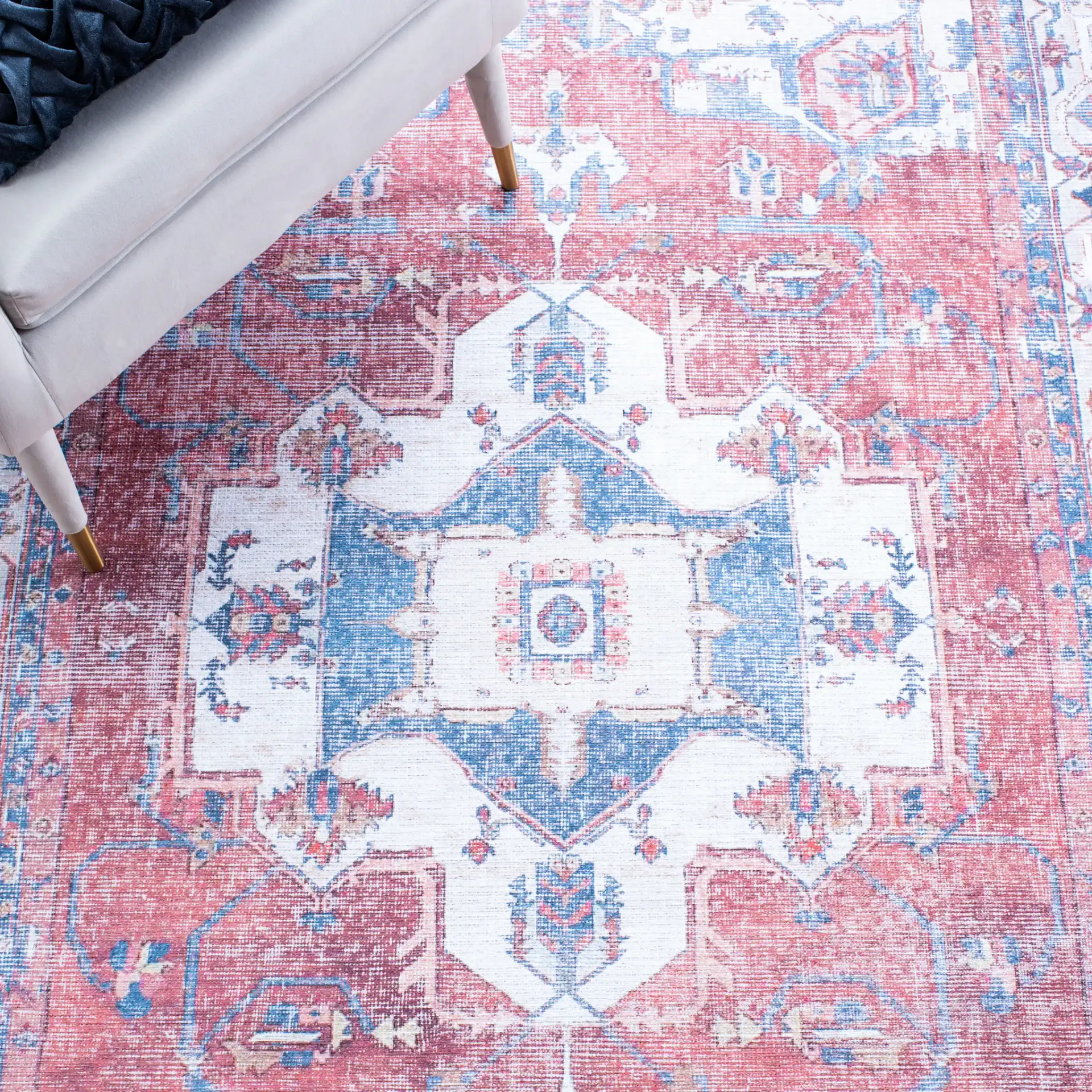 Serapi Panel Medallion Washable Rug in Red / Ivory in a styled room