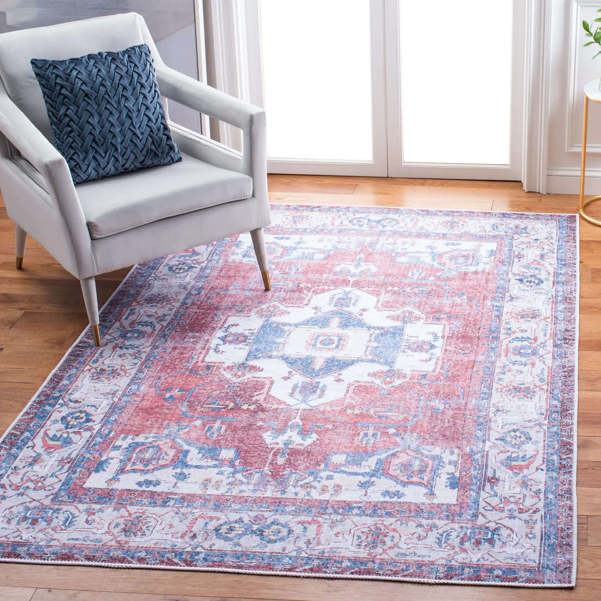 Serapi Panel Medallion Washable Rug in Red / Ivory in a styled room