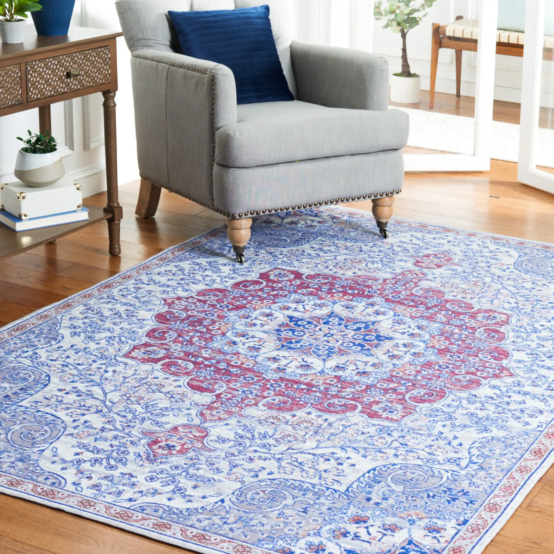 Serapi Arabesque Medallion Washable Rug in Ivory / Red in a styled room