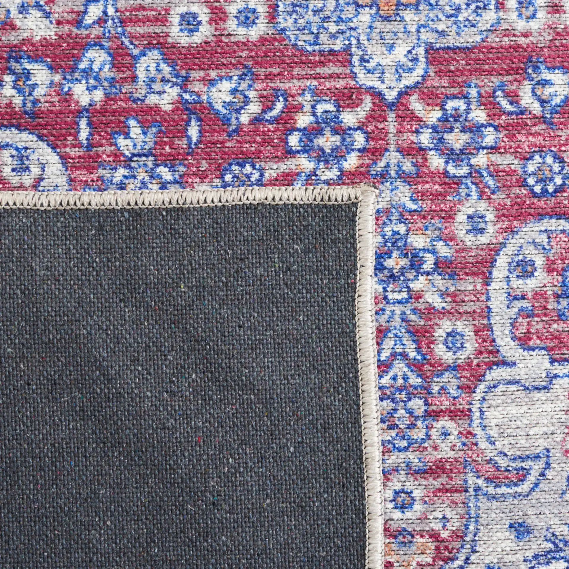 Serapi Arabesque Medallion Washable Rug in Ivory / Red in a styled room