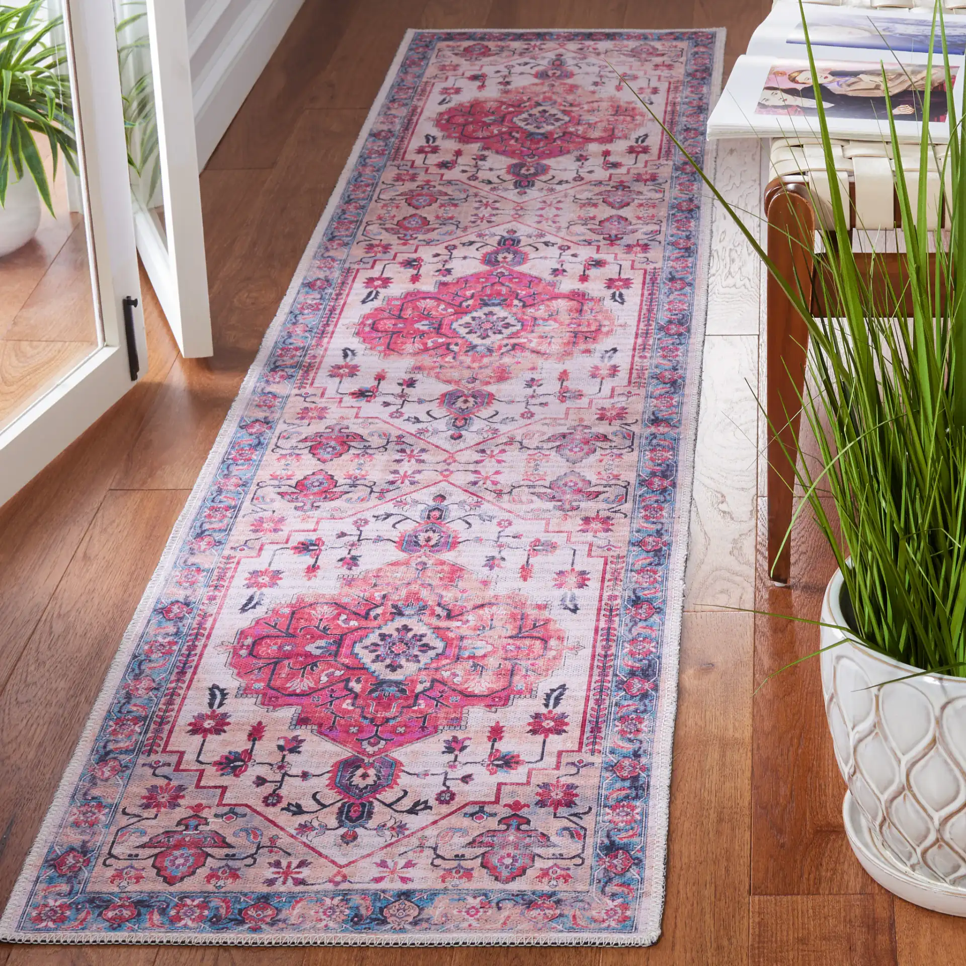 Serapi Round Medallion Washable Rug in Ivory / Light Blue in a styled room